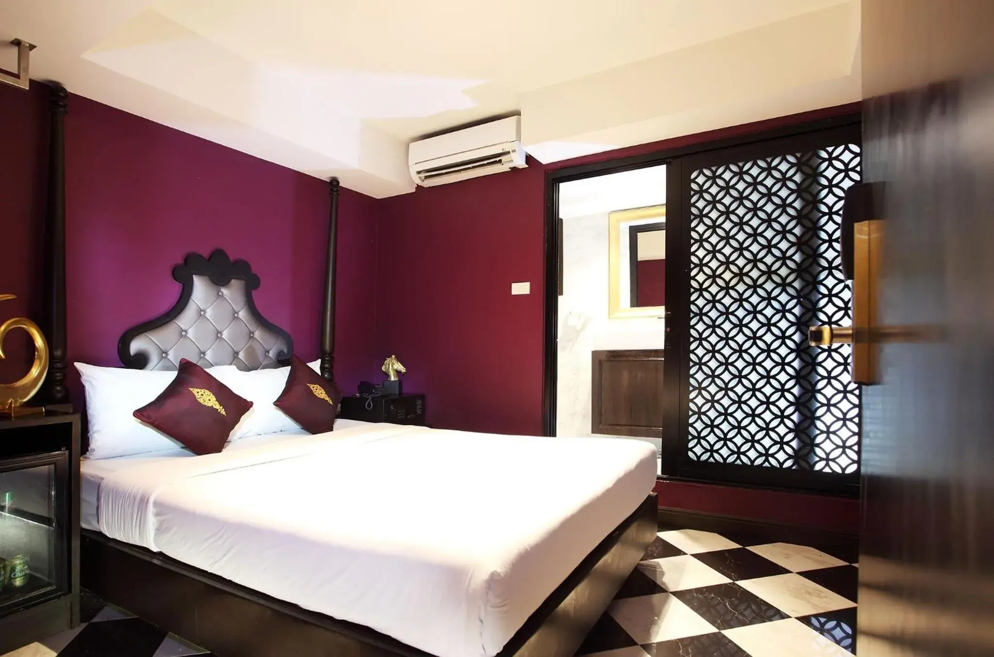 Bed in Violet Tower at Khaosan Palace