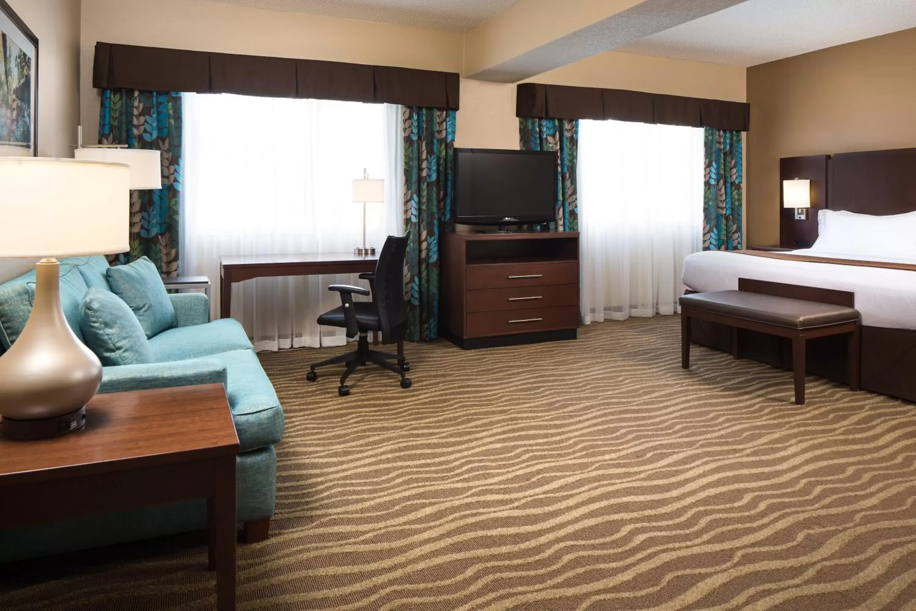 Photo of the whole room, TV/Entertainment Center in Holiday Inn Hotel & Suites Overland Park-West, an IHG Hotel