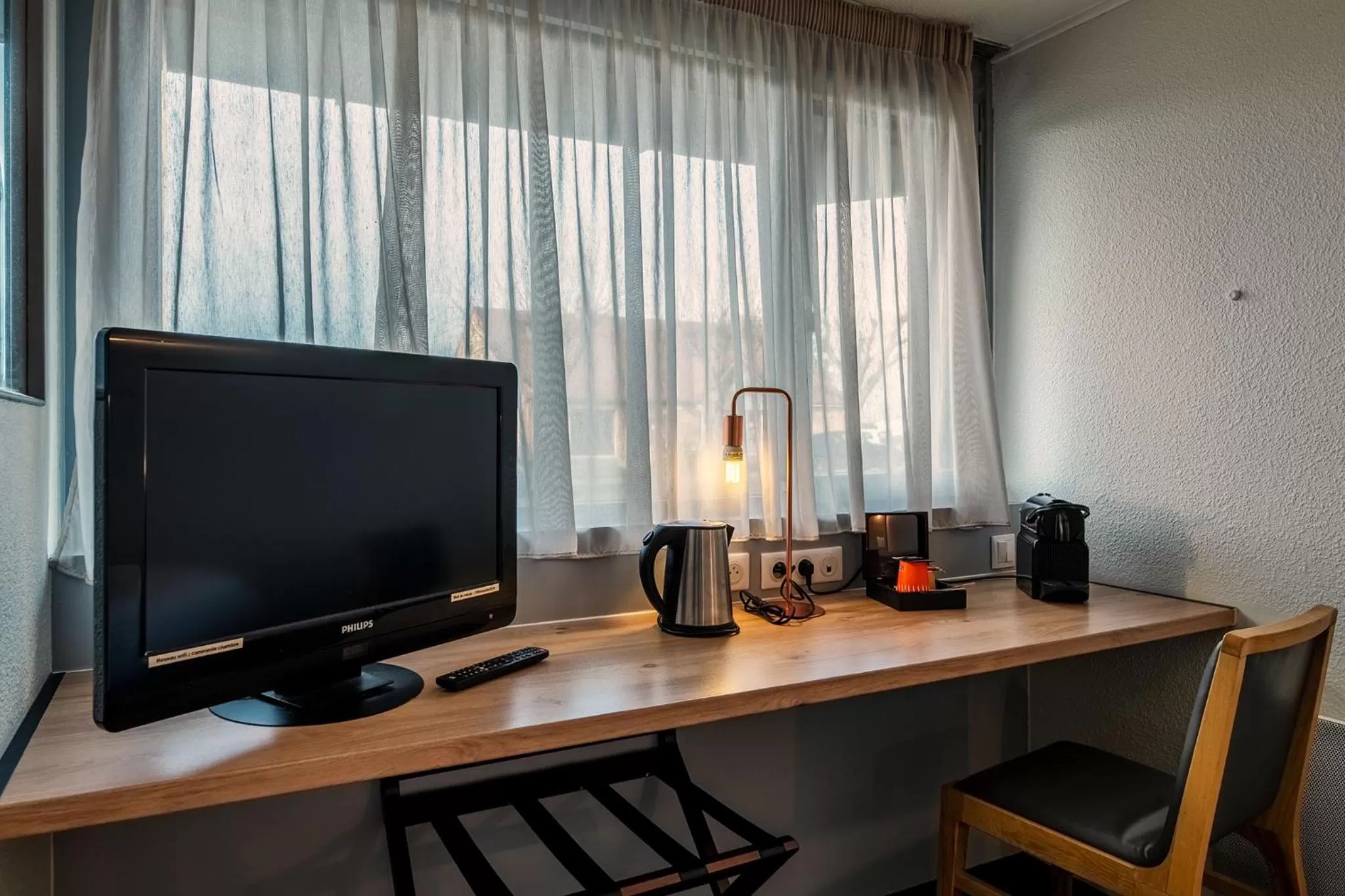 TV and multimedia in Hôtel Le Cyrano Bergerac