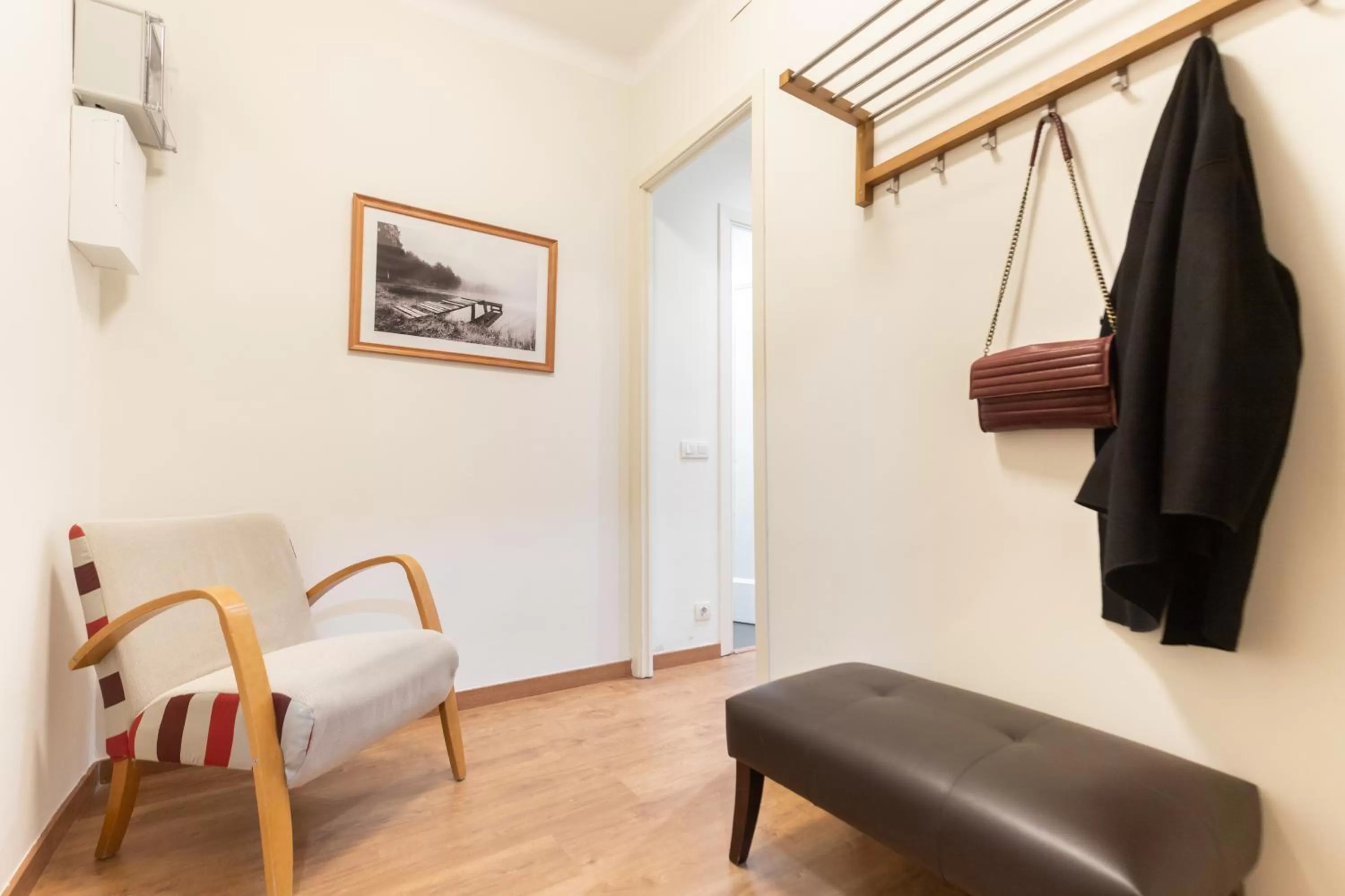 Seating area in Atica Apartments - by Weflating