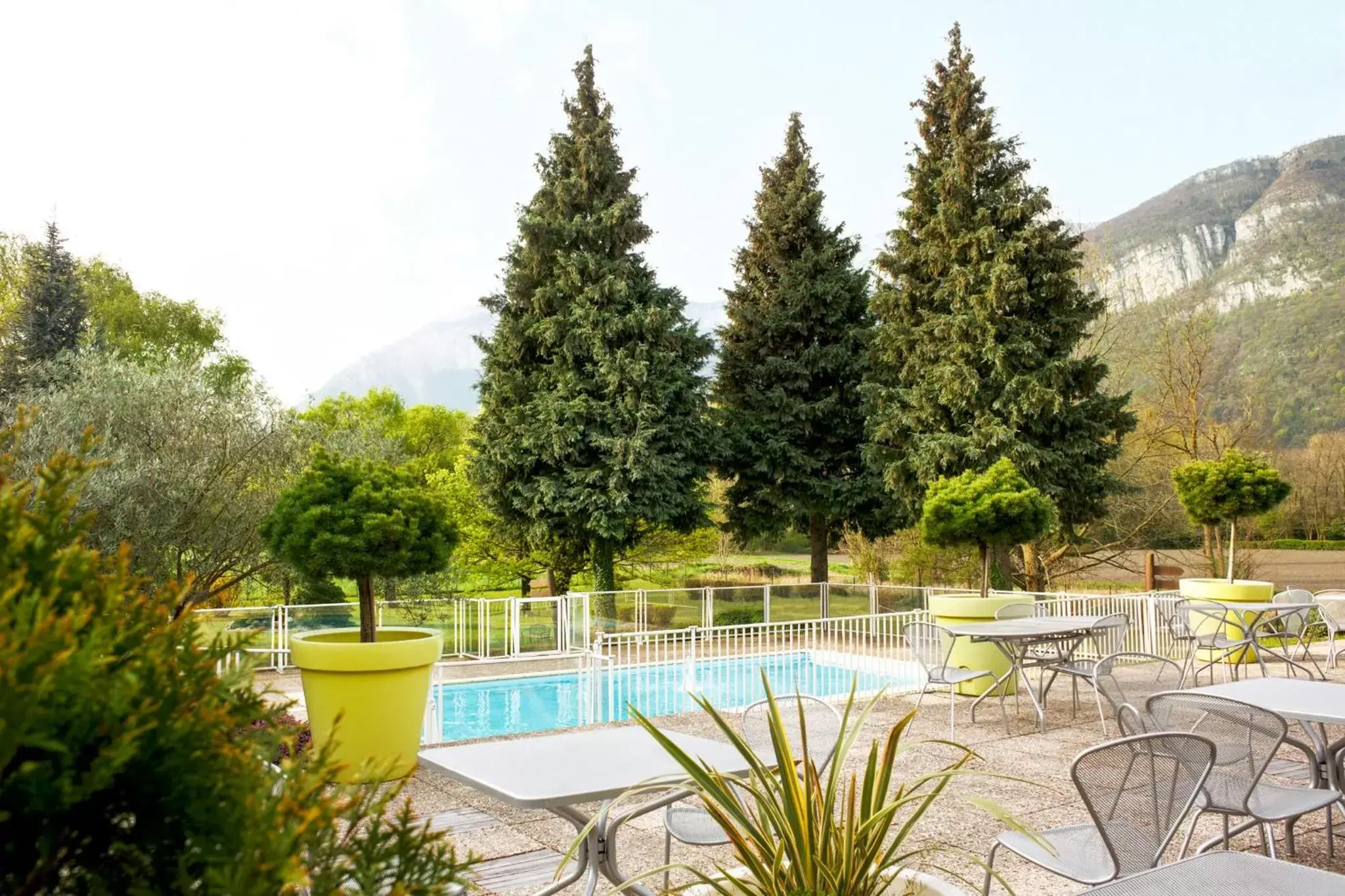View (from property/room), Swimming Pool in Novotel Grenoble Nord Voreppe