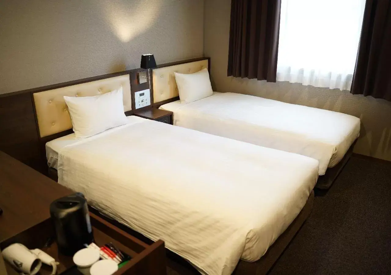 Bed in Welina Hotel Premier Shinsaibashi