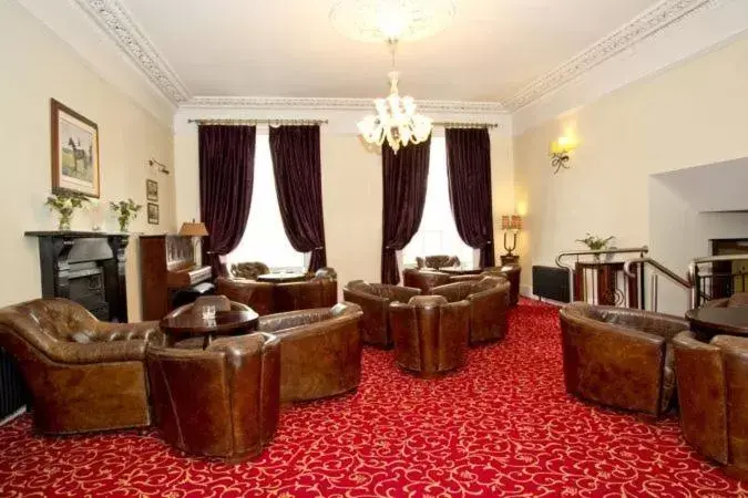 Communal lounge/ TV room, Seating Area in Annebrook House Hotel