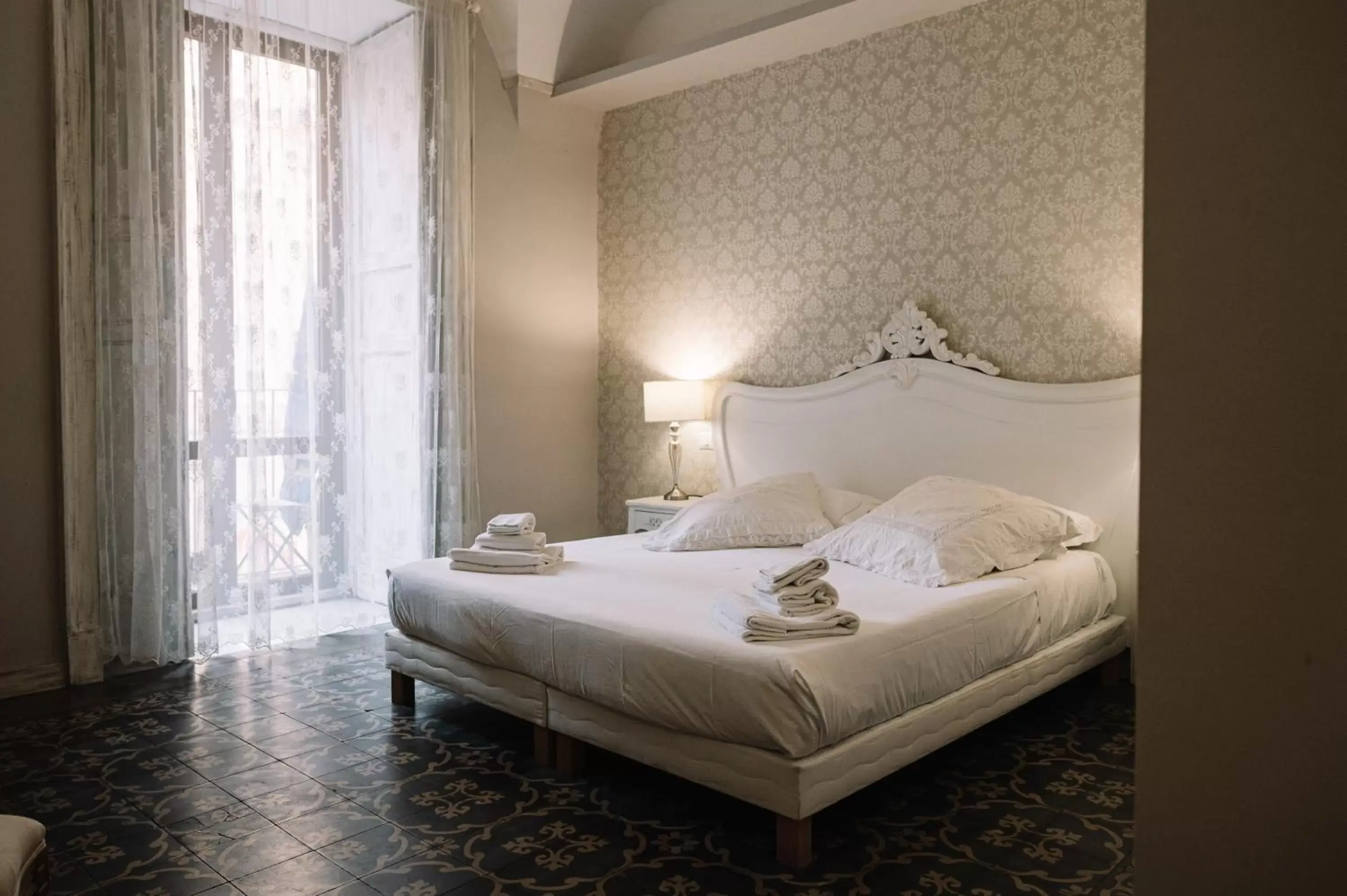 Bed in La Casa di Alma Luxury rooms