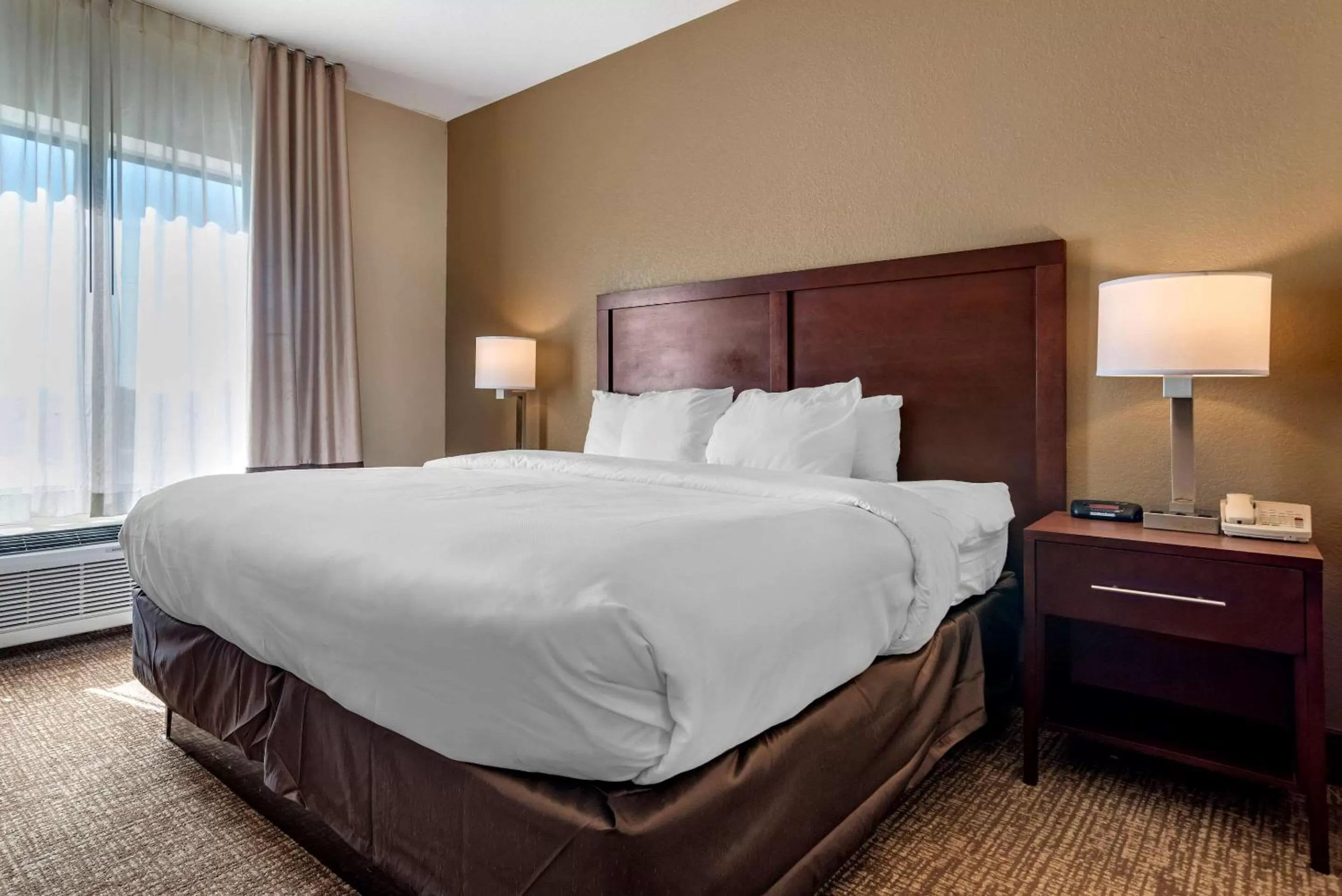 Photo of the whole room, Bed in Comfort Inn & Suites Clinton - Jackson West