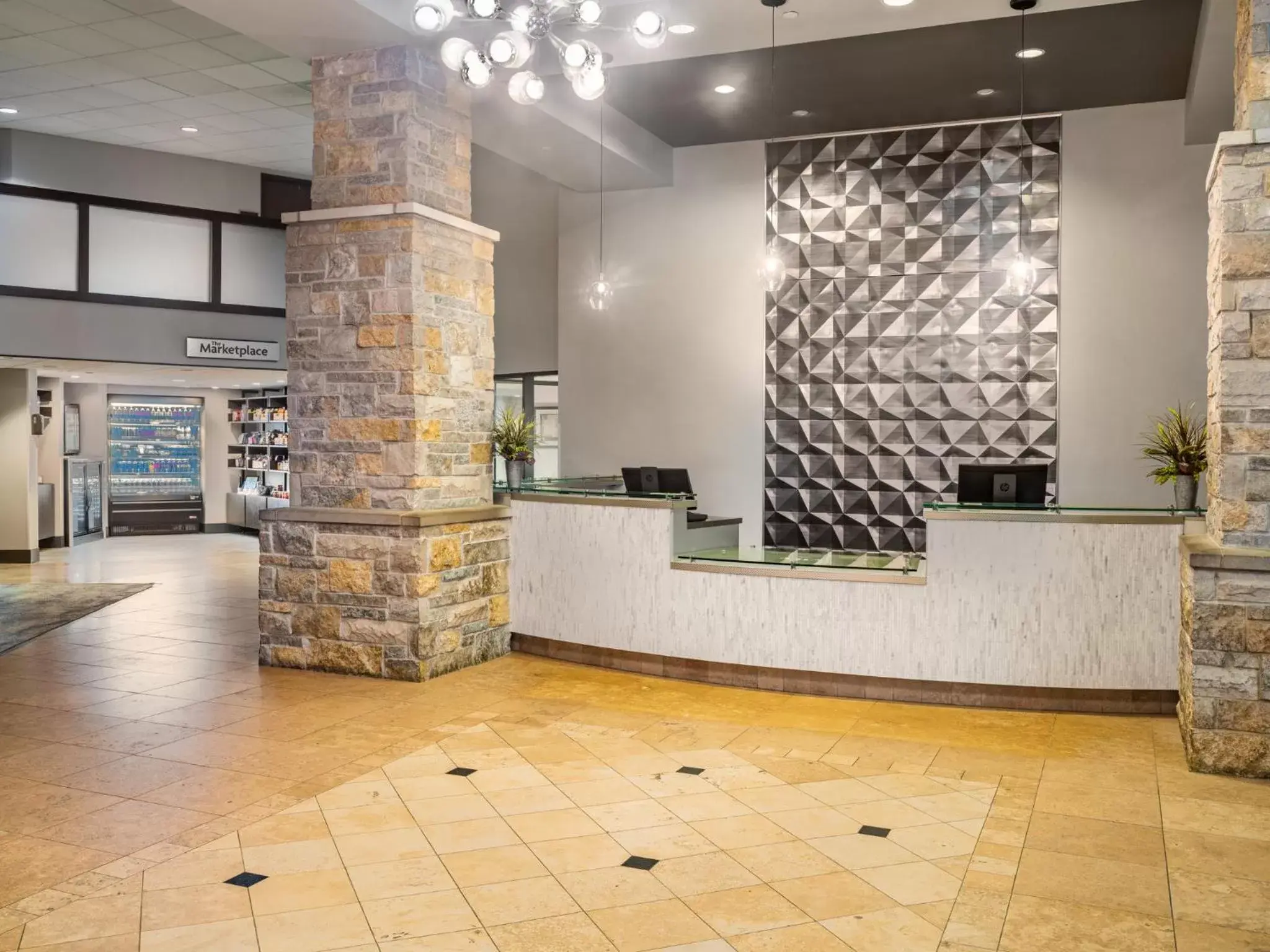 Property building, Lobby/Reception in Crowne Plaza Milwaukee South, an IHG Hotel
