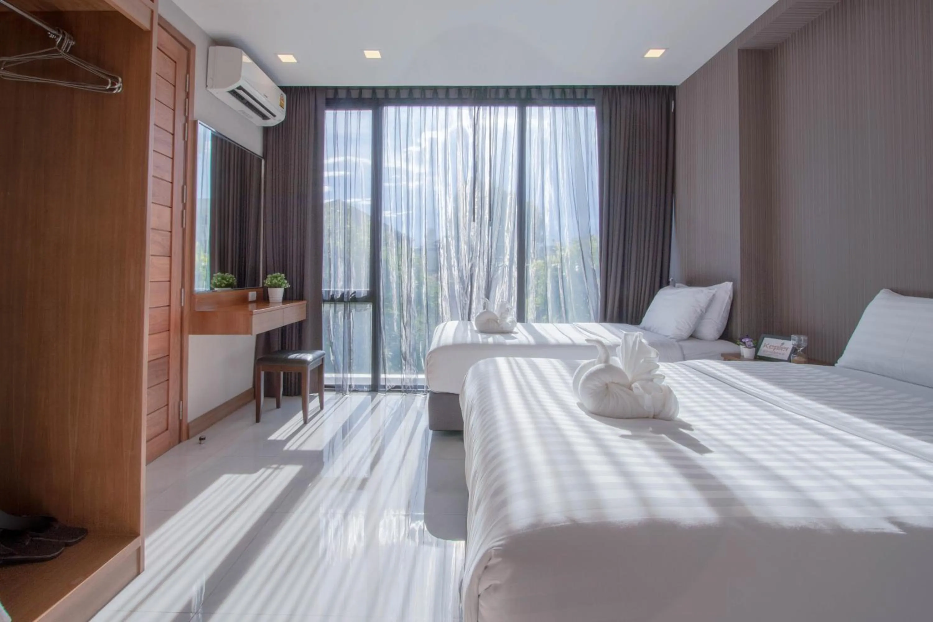 Bed in Kepler Residence Bangkok
