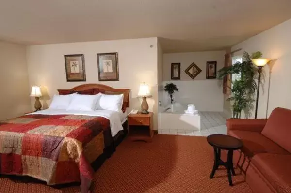 Bed in All American Inn & Suites Branson