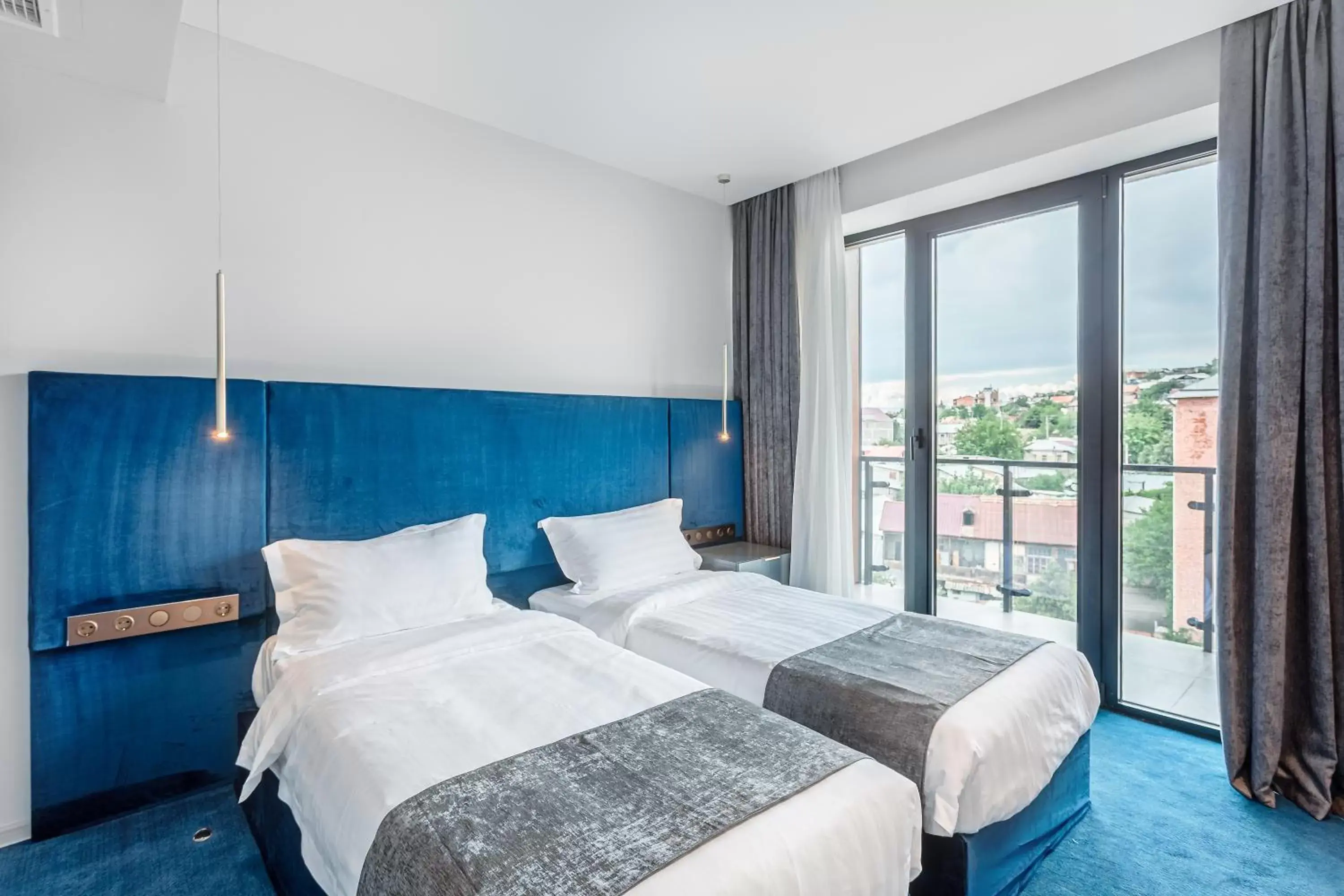 Stadard Twin Room with Balcony - Smoking in Ramada by Wyndham Tbilisi Old City Stadard Twin Room with Balcony - Smoking in Ramada by Wyndham Tbilisi Old City