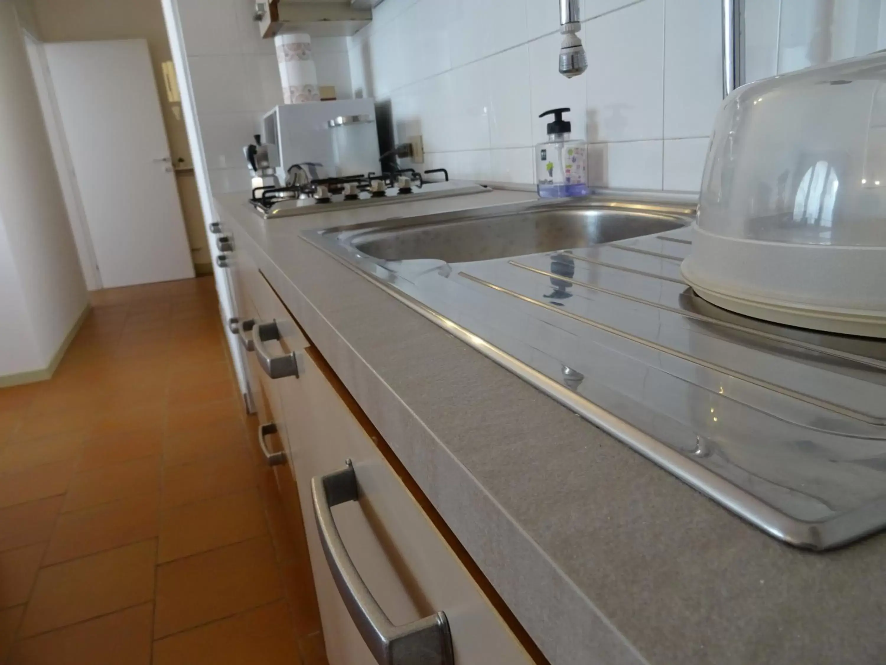 Kitchen/Kitchenette in CharmeRooms Villa Moroni