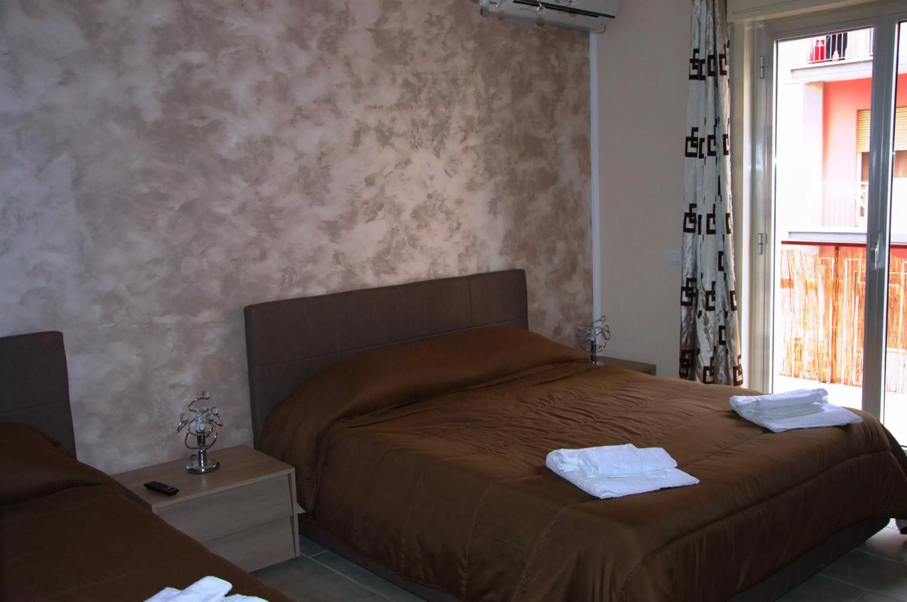 Photo of the whole room, Bed in B&B Palermo Sole & Cultura