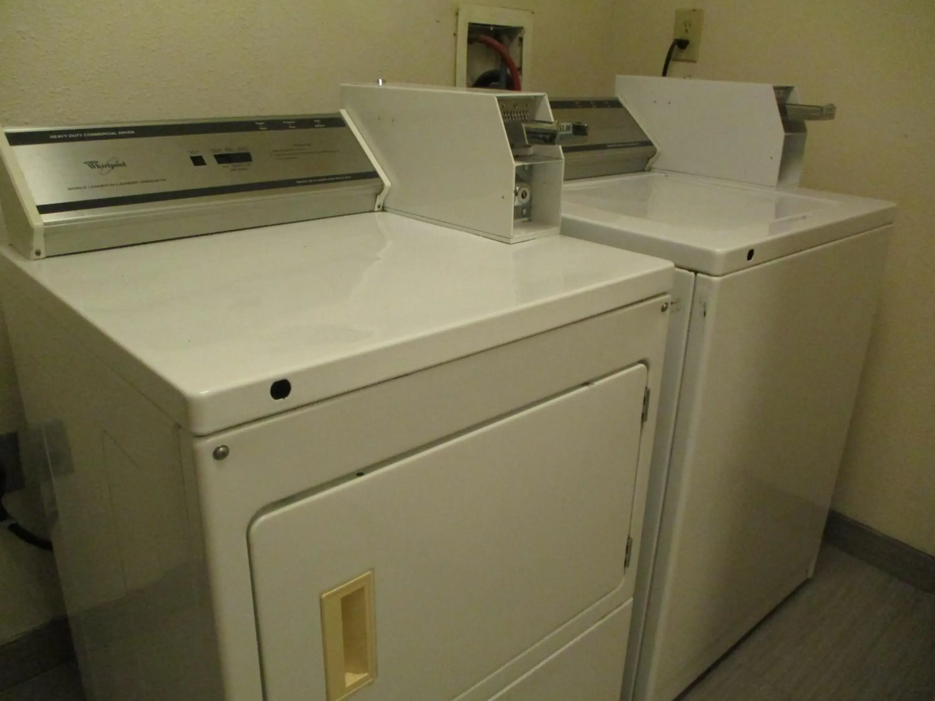 laundry, Bathroom in Days Inn & Suites by Wyndham Sam Houston Tollway