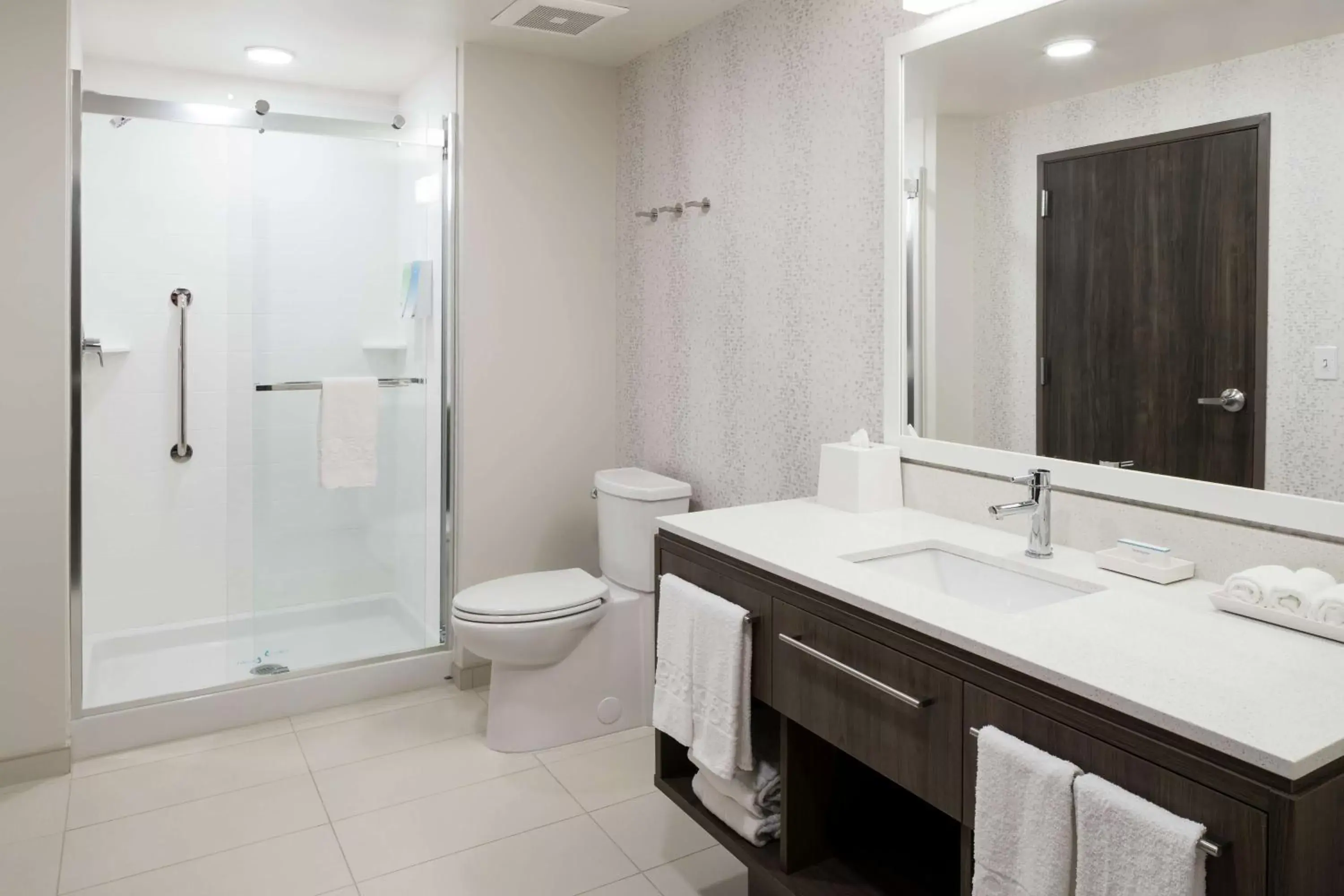 Bathroom in Home2 Suites By Hilton Orlando Airport