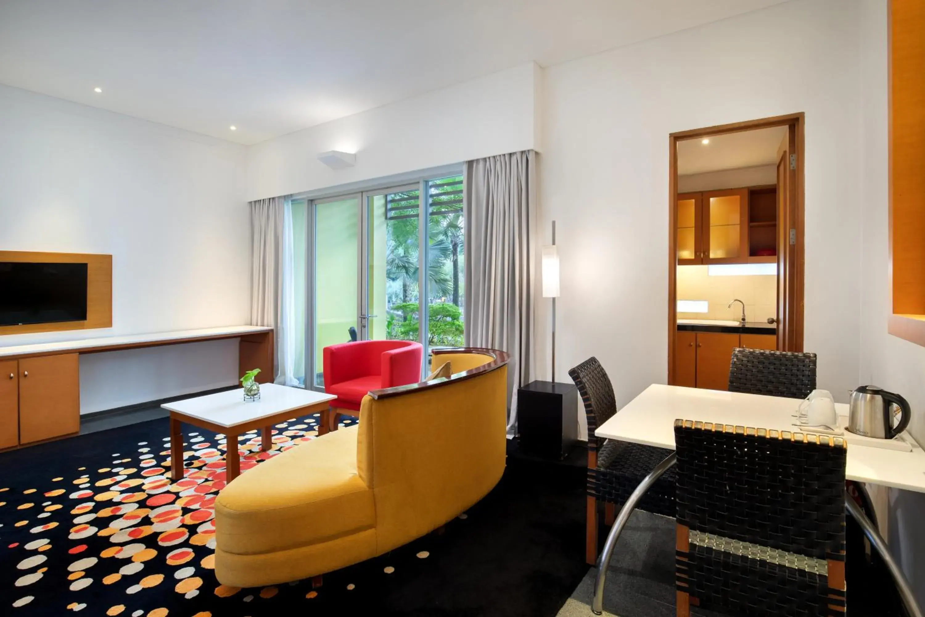 Living room, Seating Area in Novotel Palembang Hotel