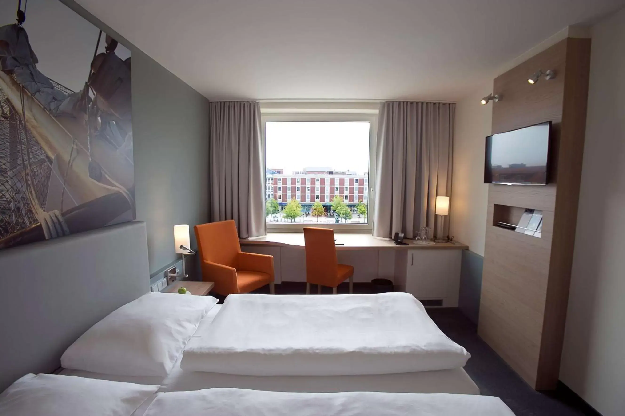 Photo of the whole room, Bed in Nordsee Hotel City