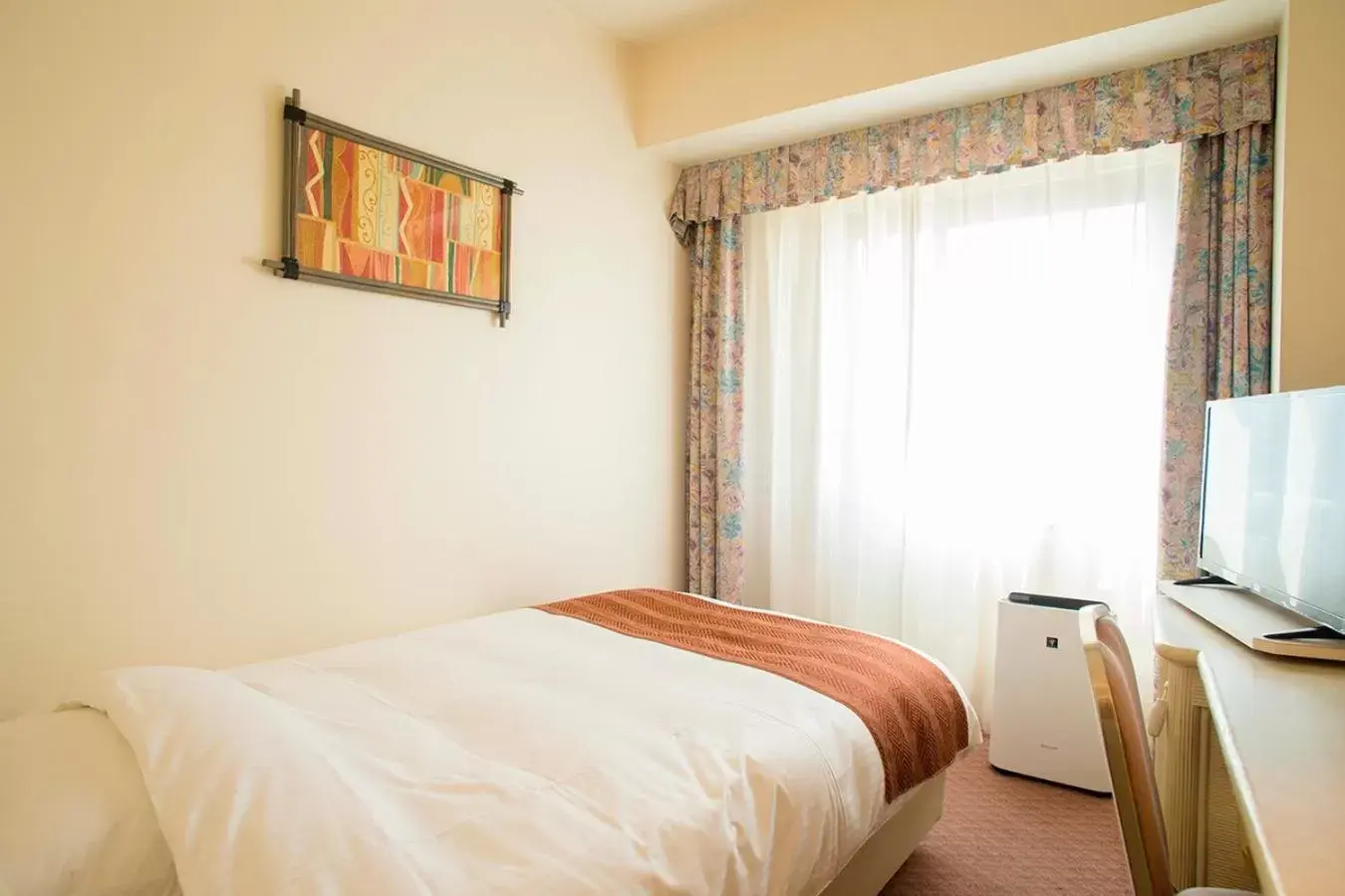 Photo of the whole room, Bed in ANA Holiday Inn Resort Miyazaki, an IHG Hotel