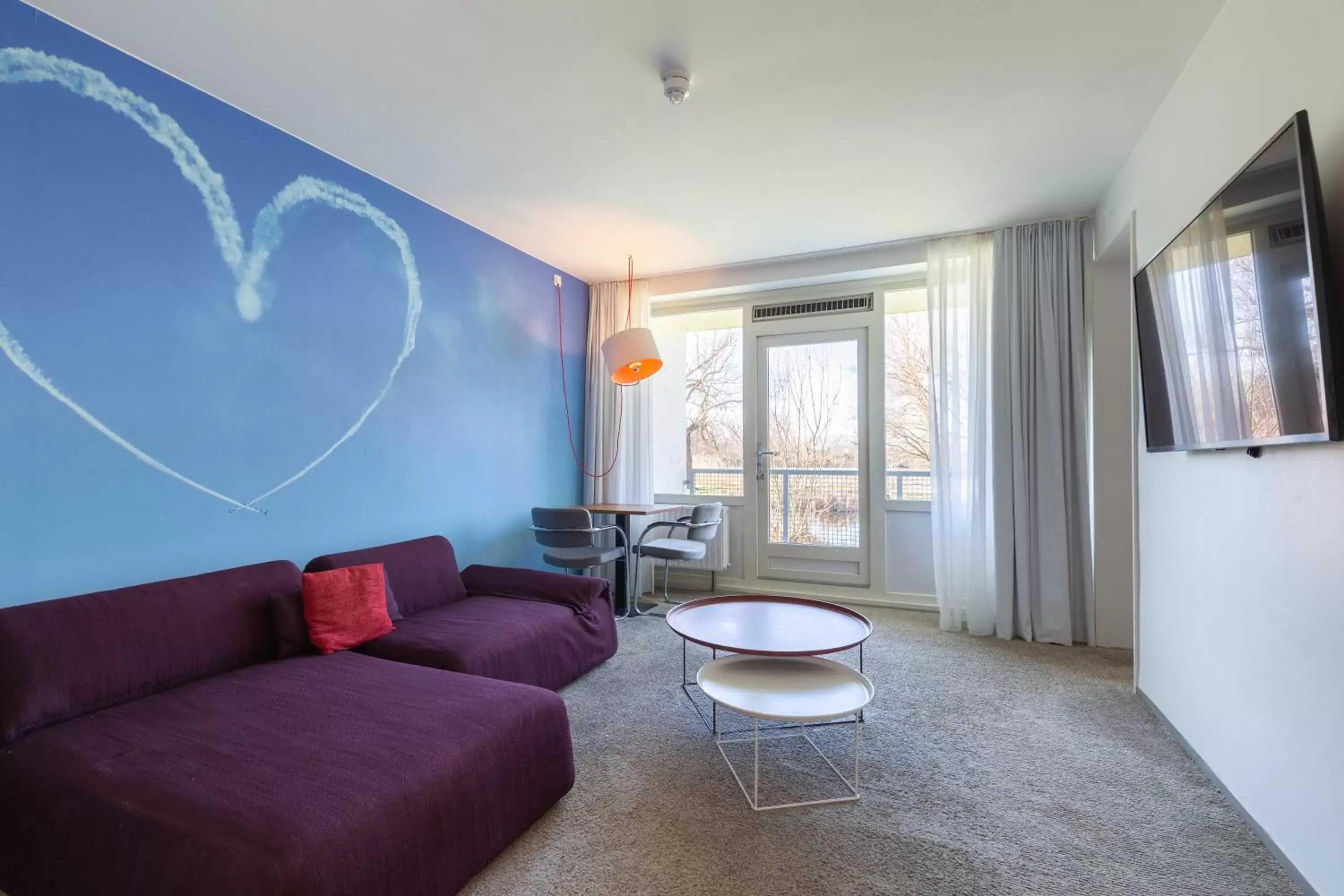 Bedroom, Seating Area in Amrâth Airport Hotel Rotterdam, BW Signature Collection