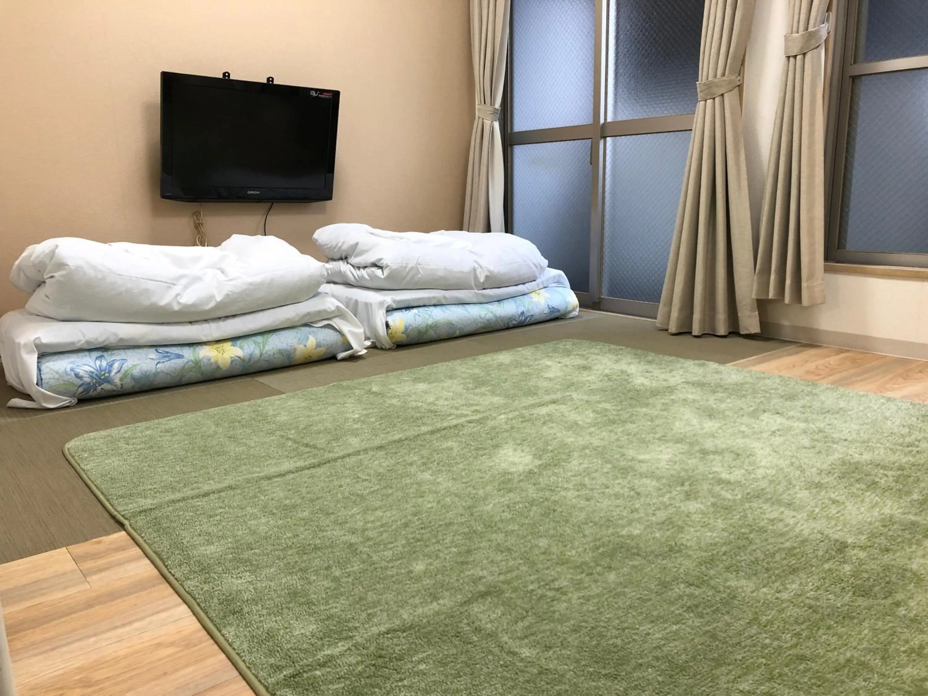 Bed in Hotel Mirai