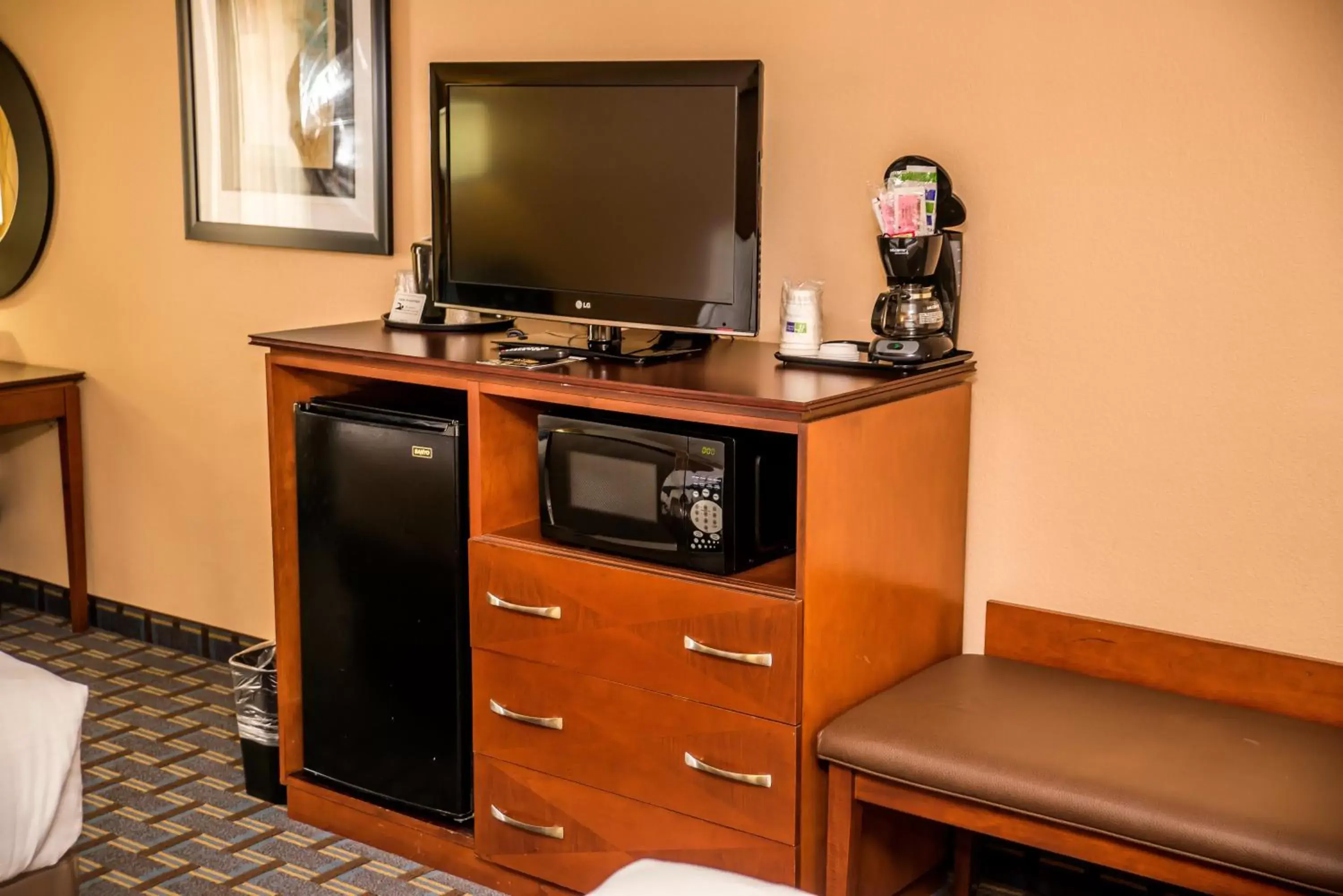 Photo of the whole room, TV/Entertainment Center in Holiday Inn Express Hotel & Suites Cocoa Beach, an IHG Hotel