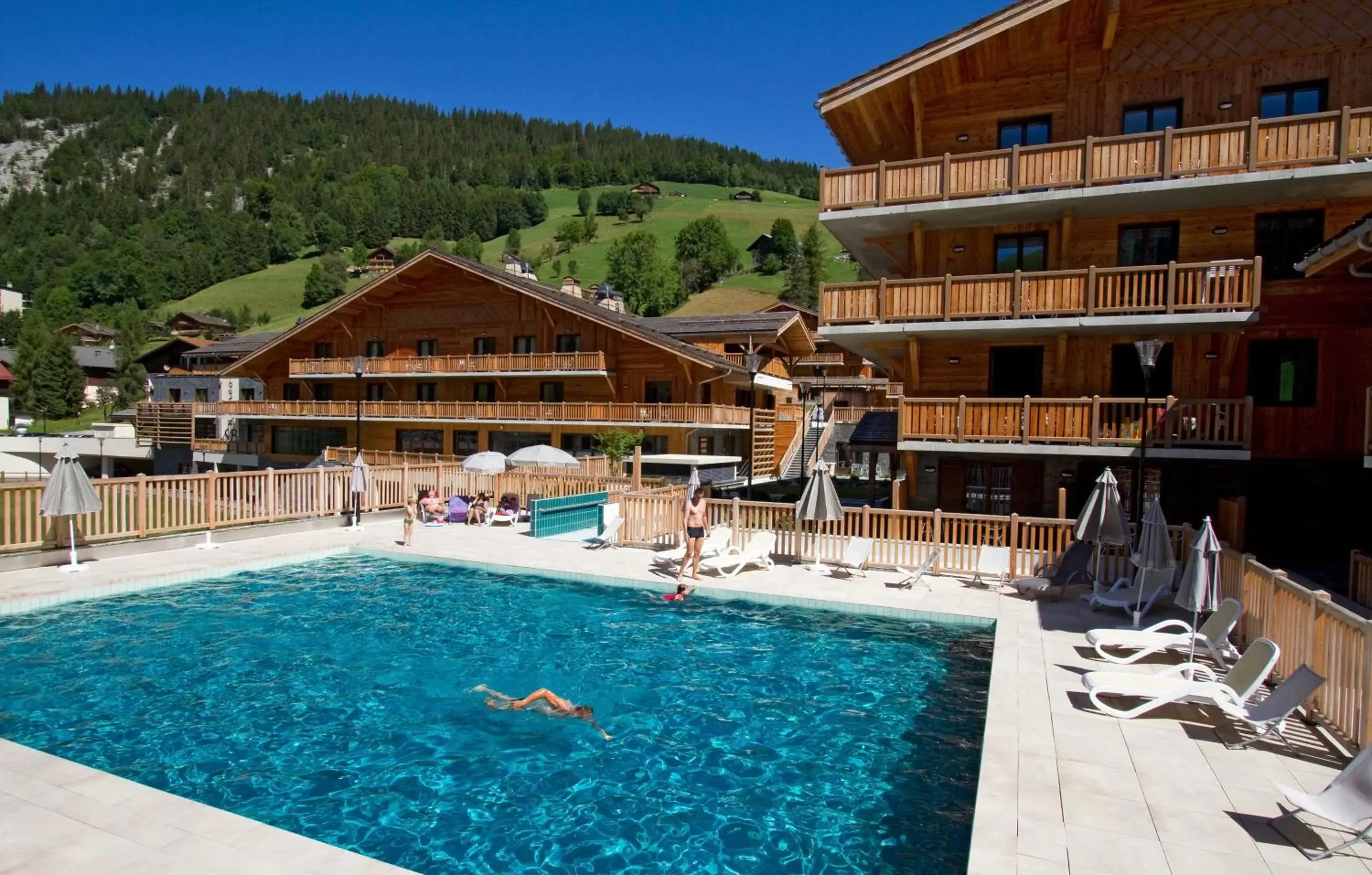Swimming Pool in Hôtel Prestige Odalys Le Chamois
