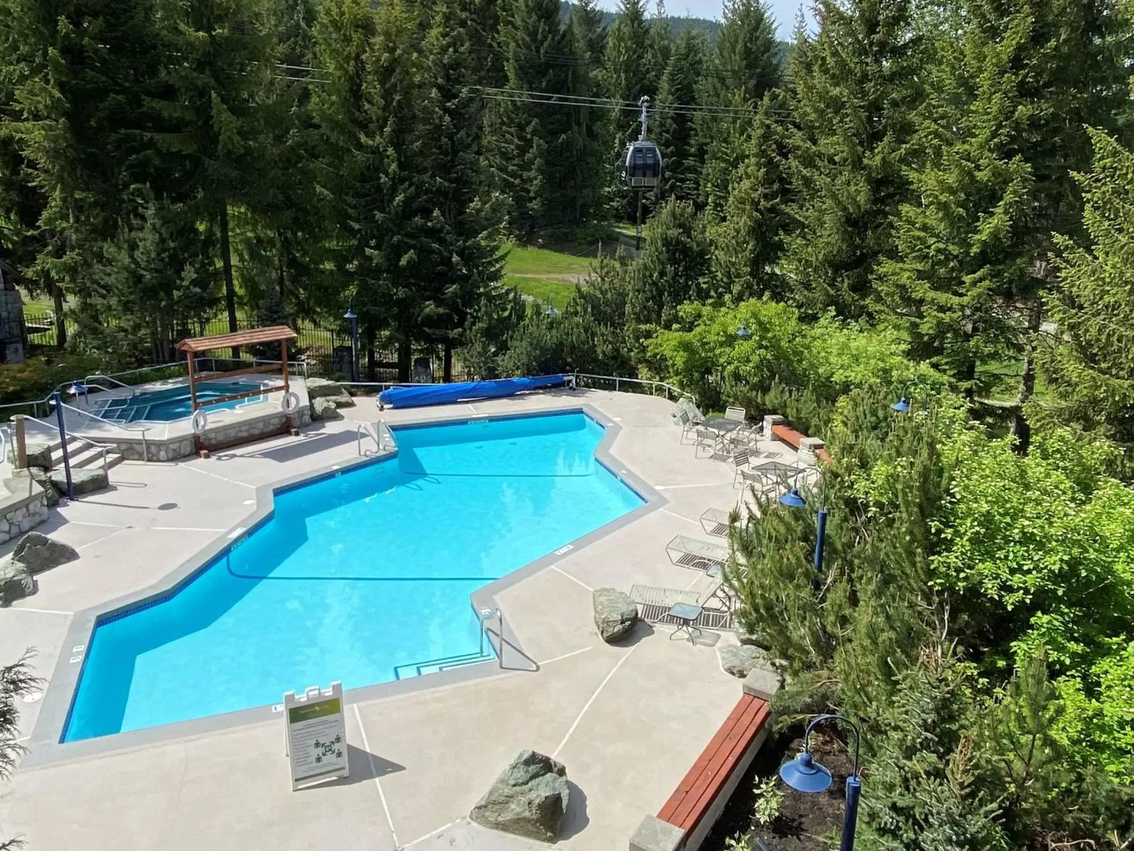 Pool View in Blackcomb Springs Suites by CLIQUE