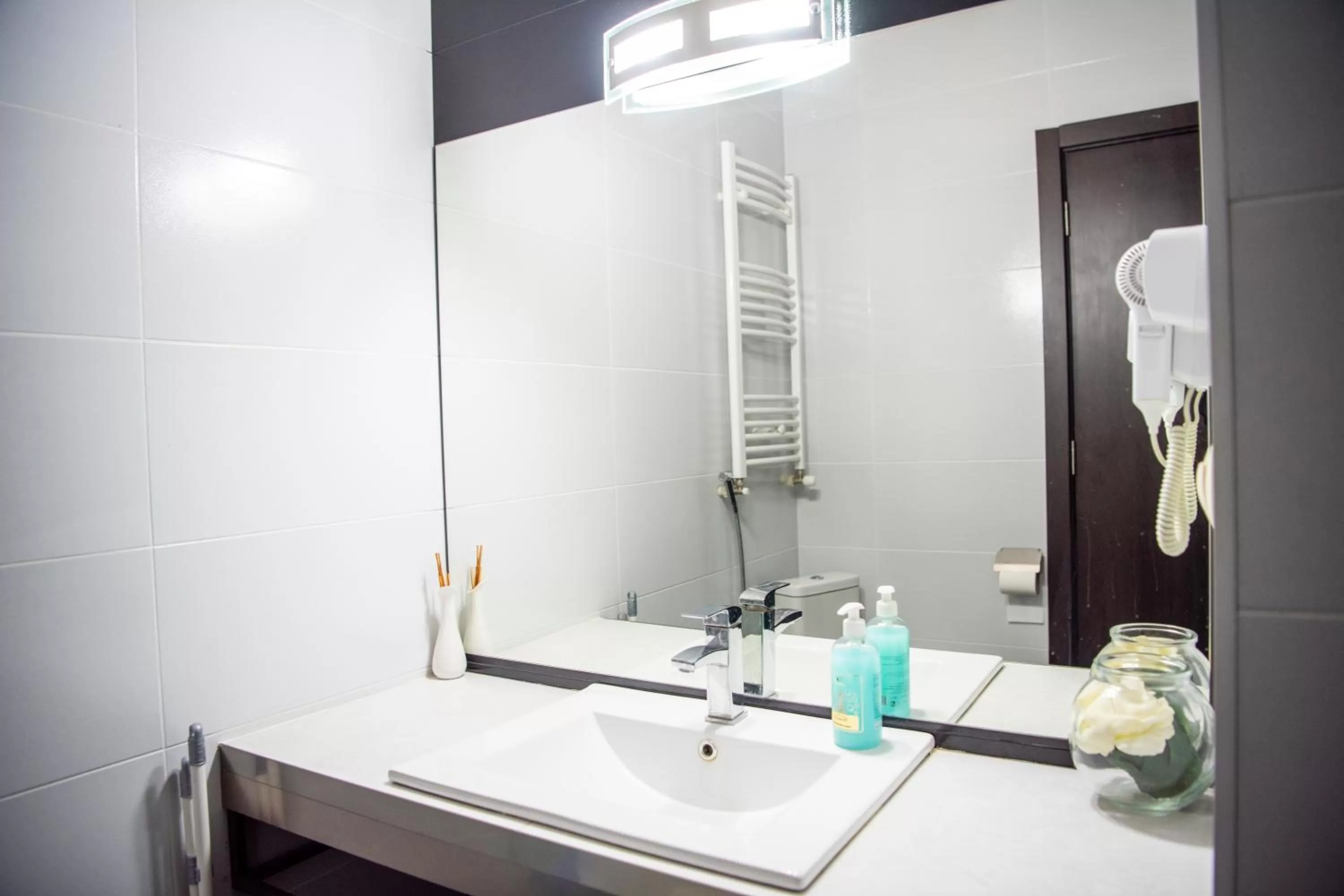 Bathroom in Sani Apart Hotel