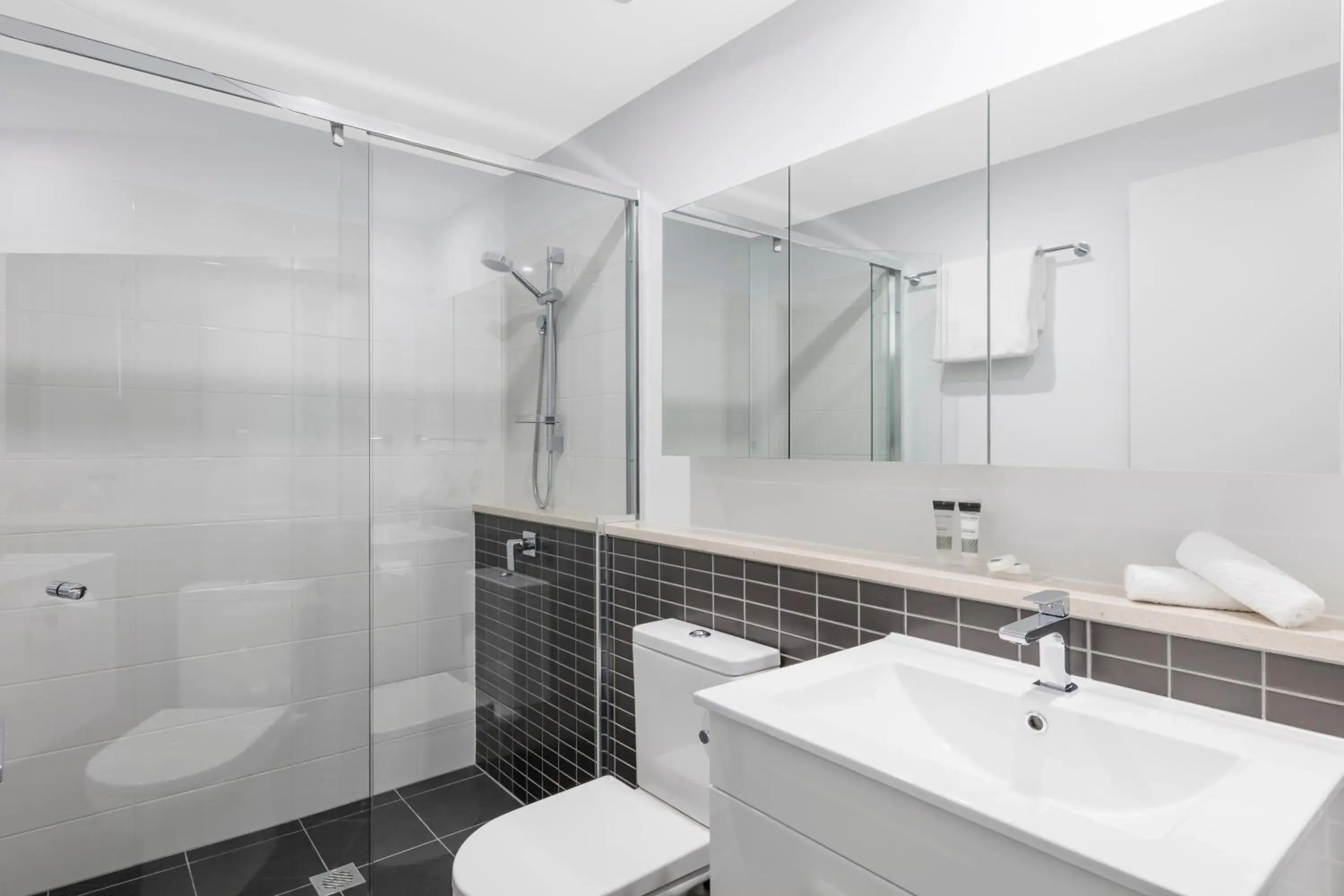 Shower, Bathroom in Oaks Brisbane Woolloongabba Suites