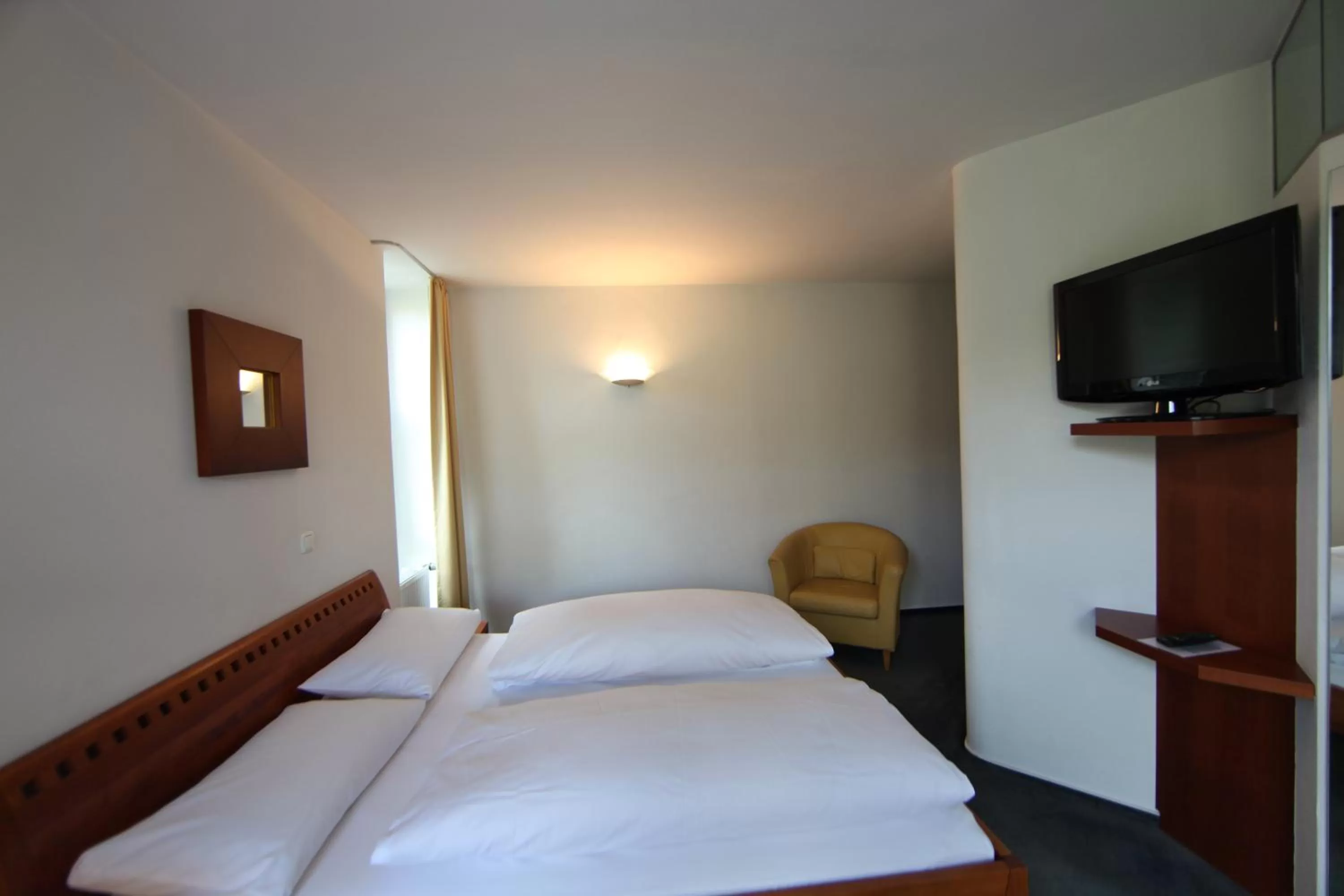 Photo of the whole room, Bed in Wald & Golfhotel Lottental