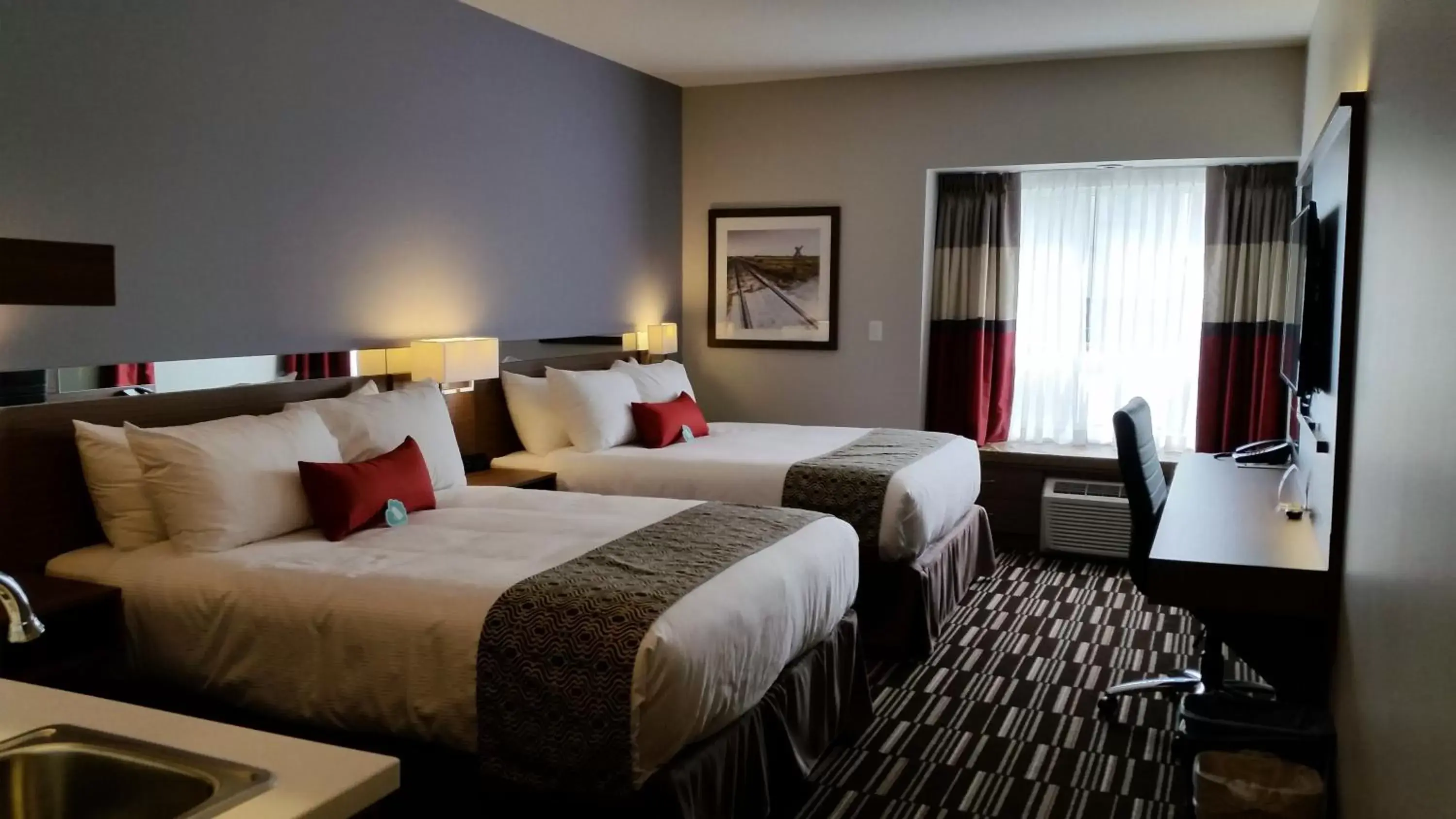 Photo of the whole room, Bed in Microtel Inn & Suites by Wyndham Bonnyville
