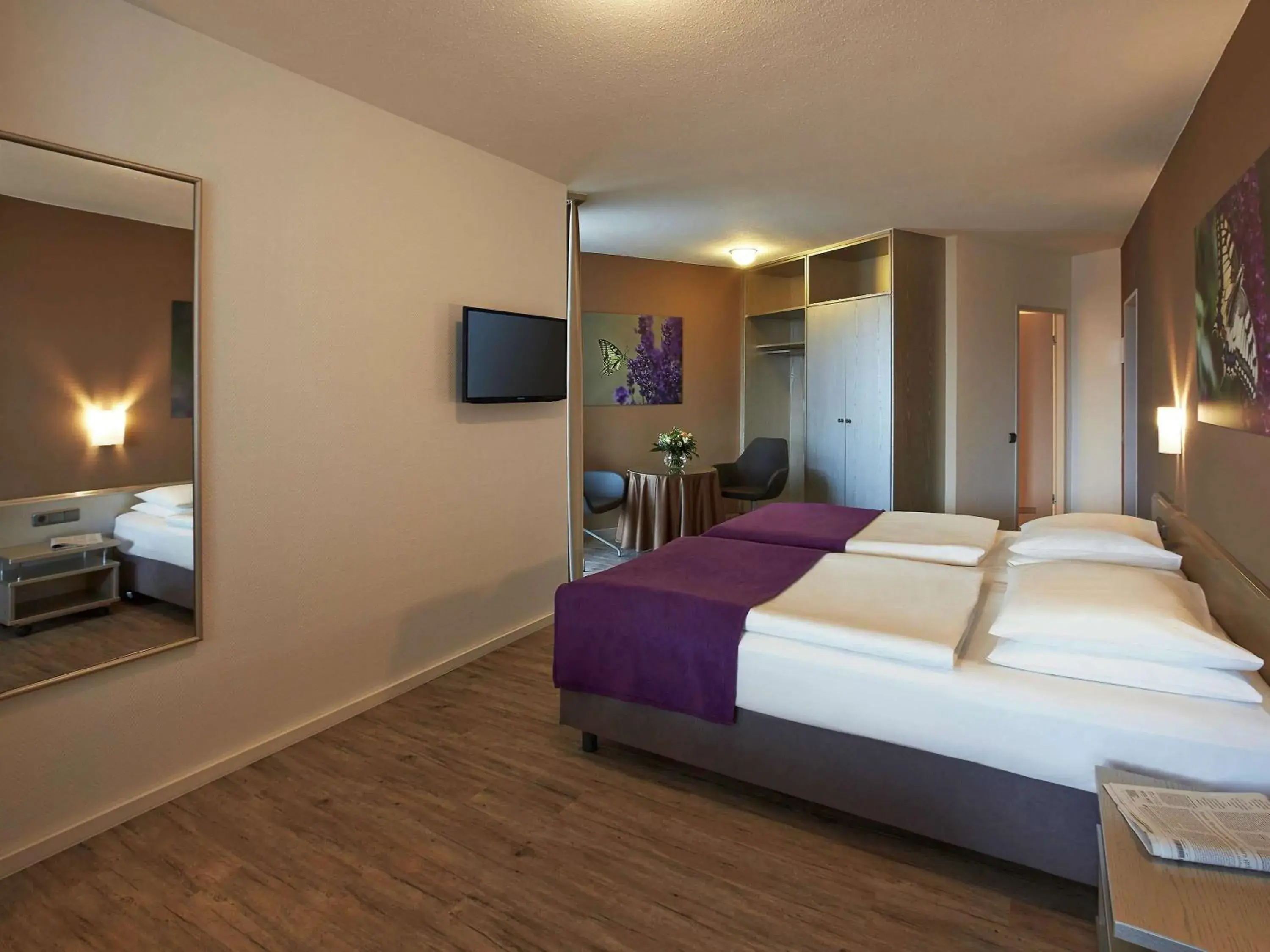 Photo of the whole room, Bed in Mercure Hotel Hameln
