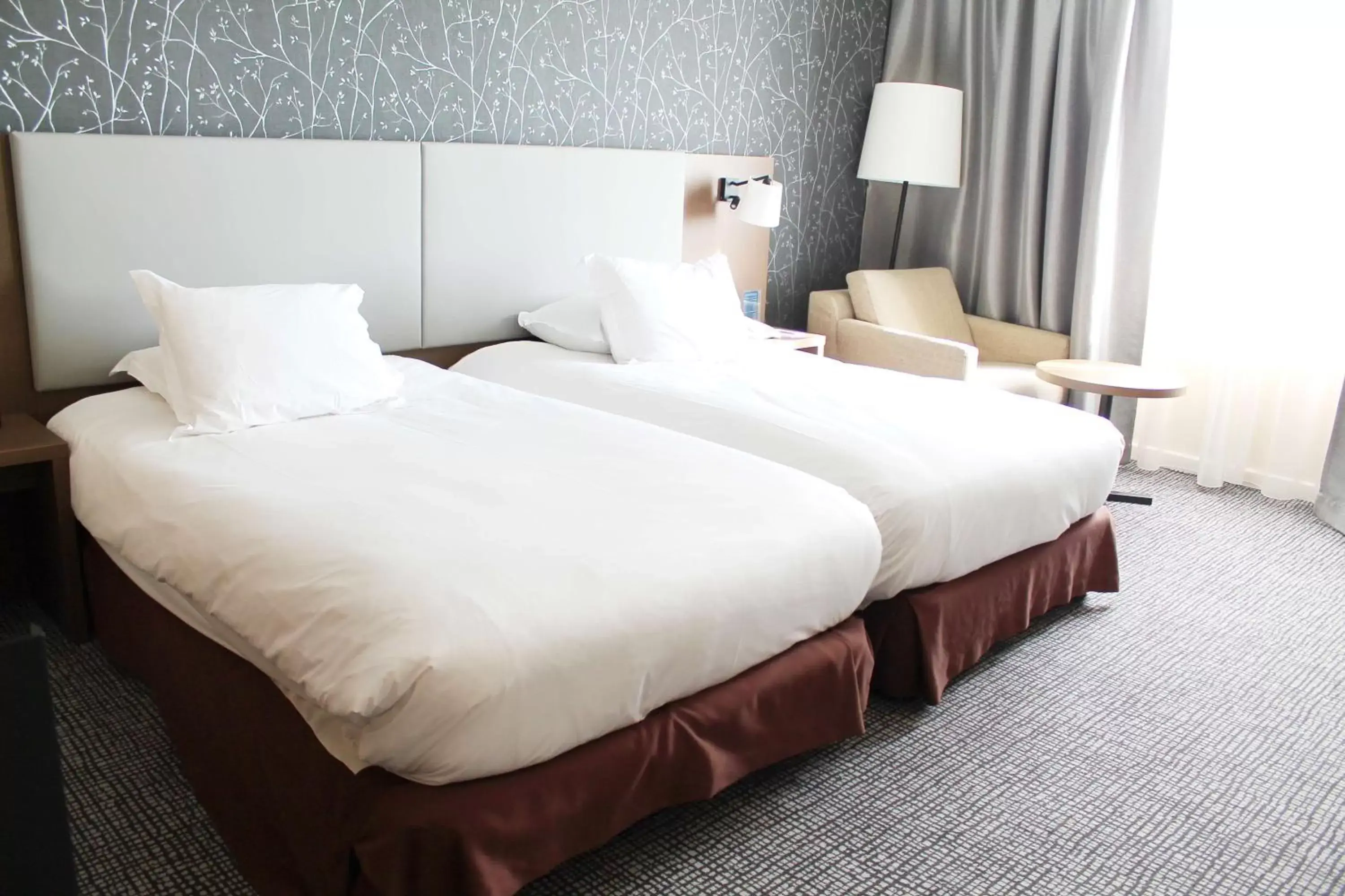 Bed in Hilton Paris Charles De Gaulle Airport