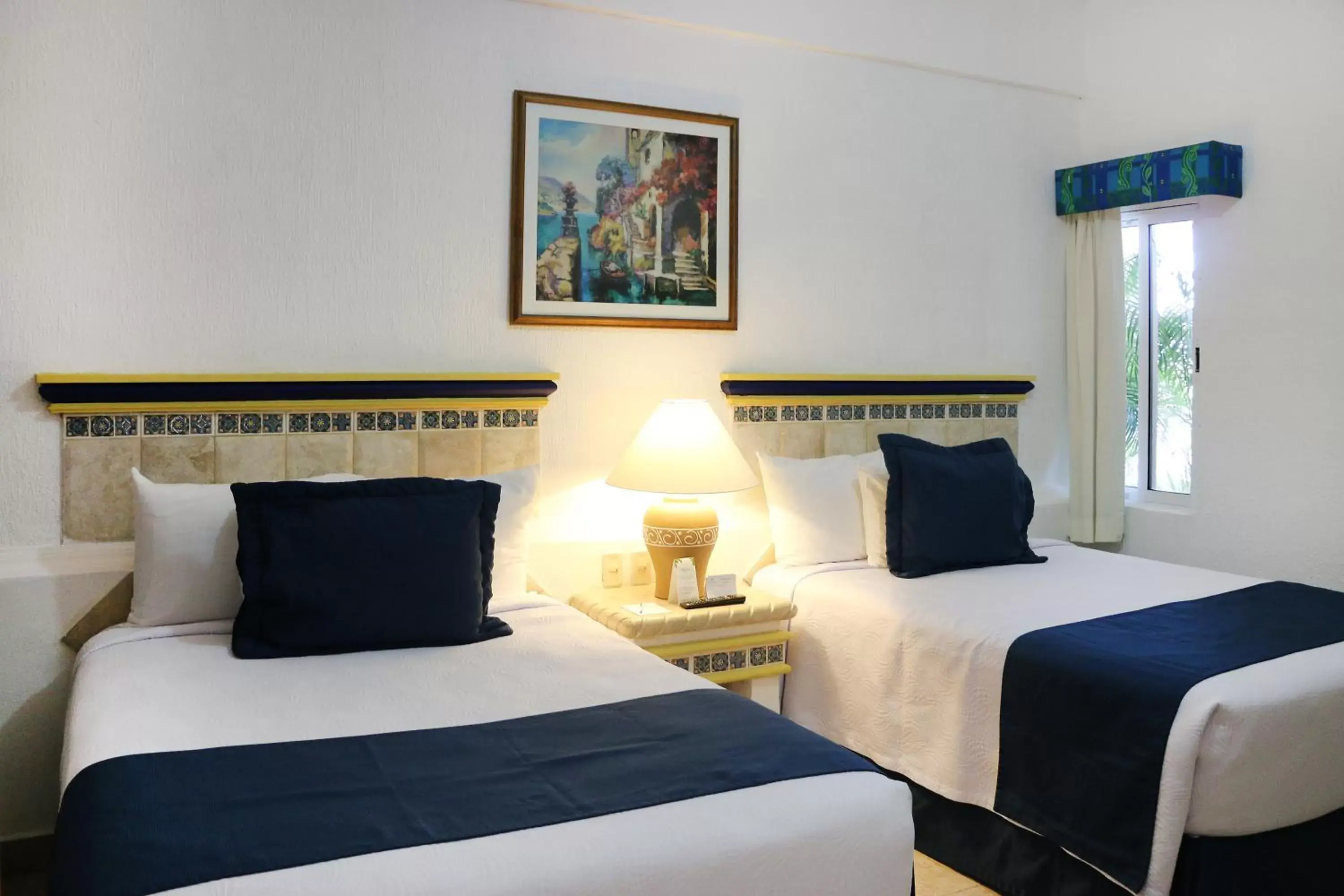 Bed in The Inn at Mazatlan
