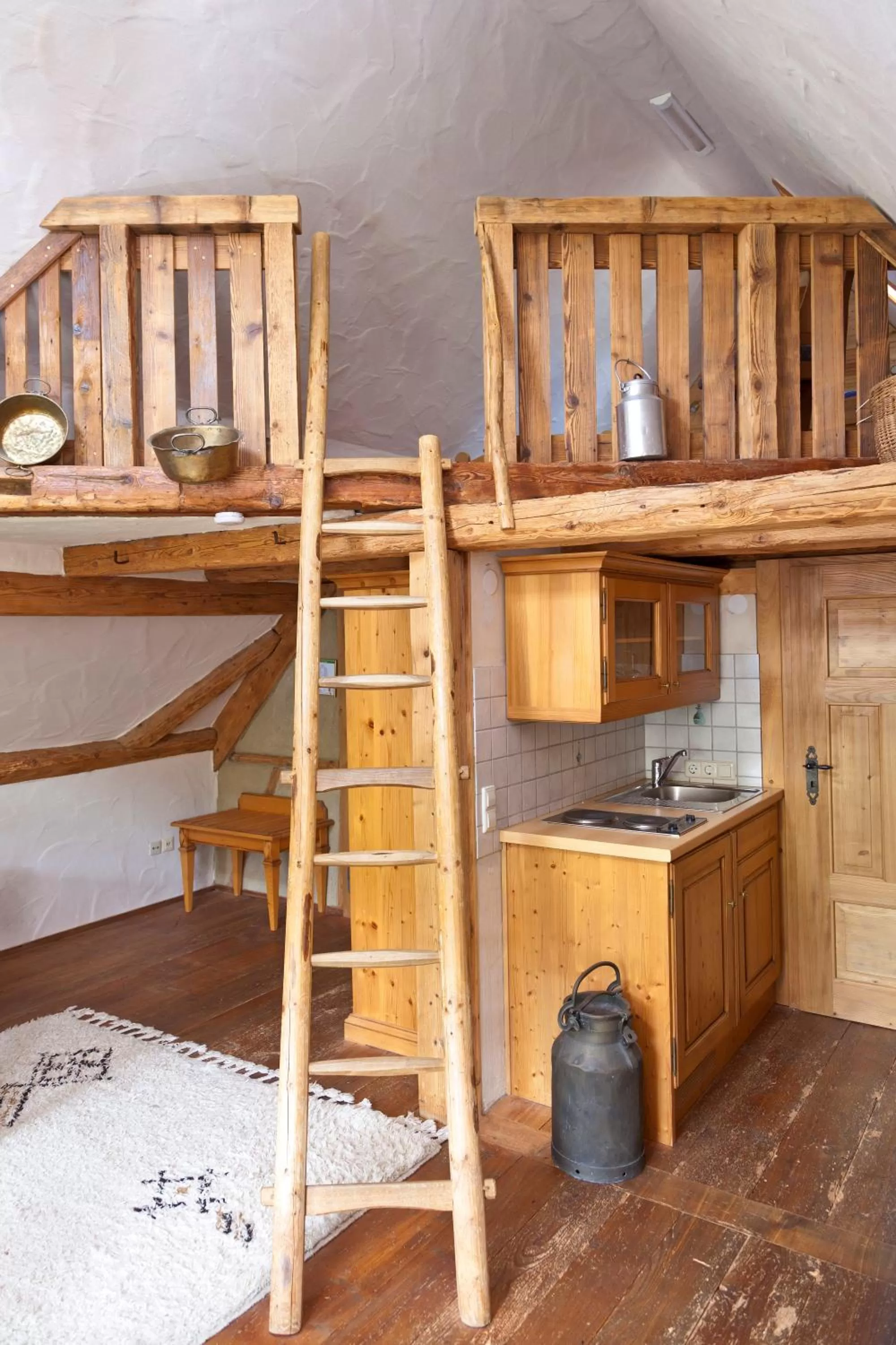 Bed in Naturhotel Holzwurm