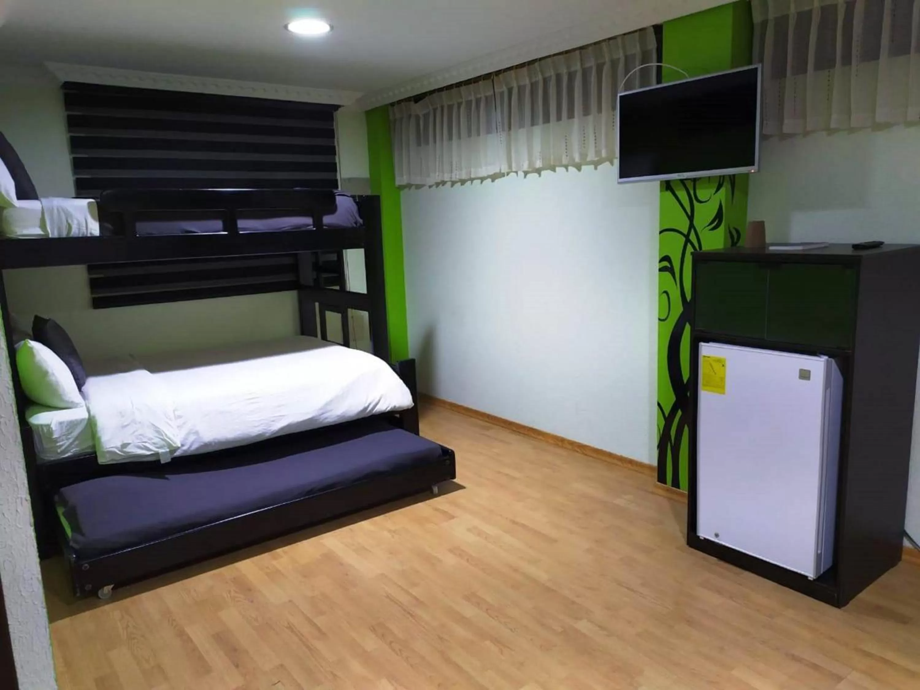 Bedroom, Bed in La Kapital Hotel