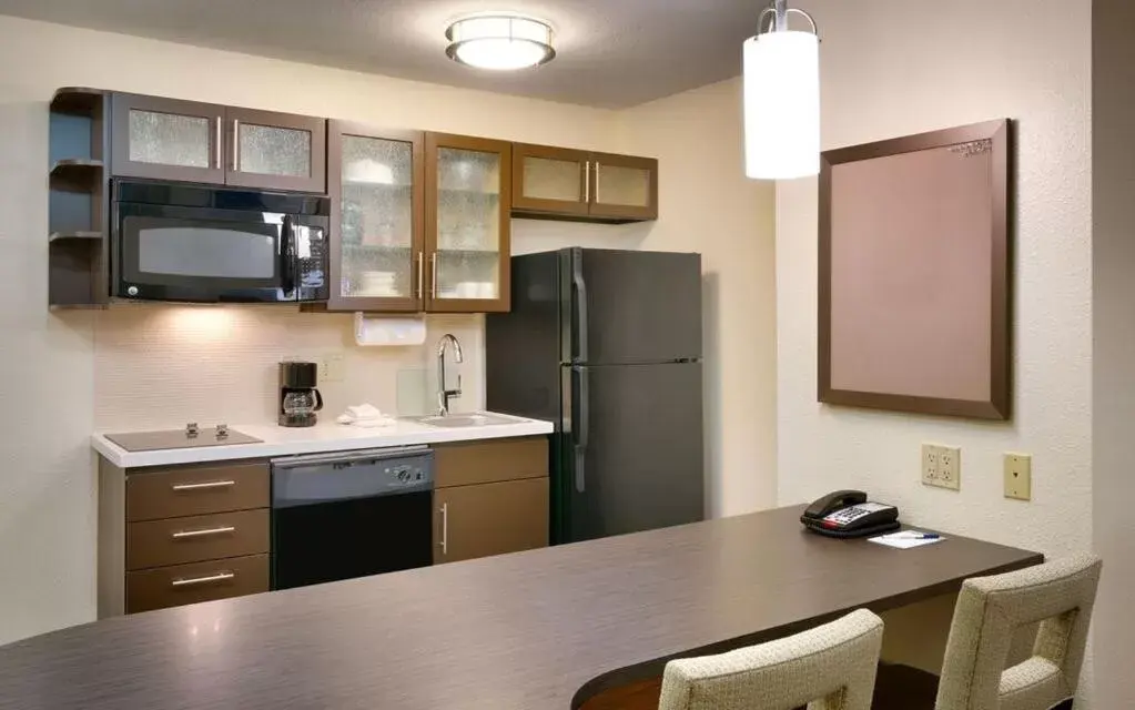 Kitchen or kitchenette, Kitchen/Kitchenette in Candlewood Suites Plano East, an IHG Hotel