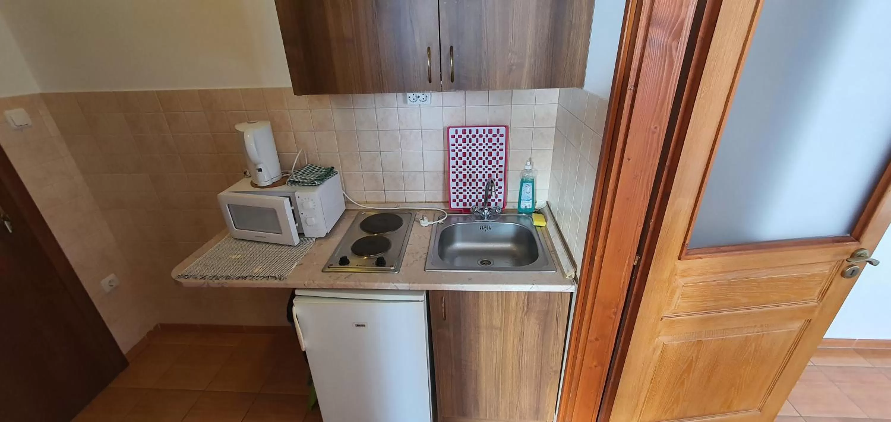 Kitchen/Kitchenette in Aqua Oazis Apartman