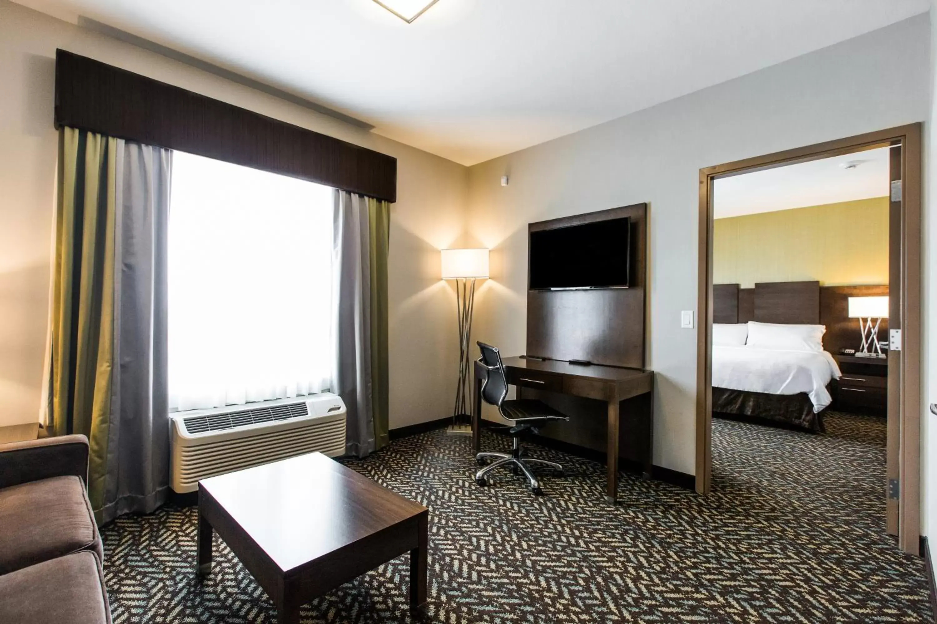 Photo of the whole room, TV/Entertainment Center in Holiday Inn Express & Suites Spruce Grove - Stony Plain, an IHG Hotel