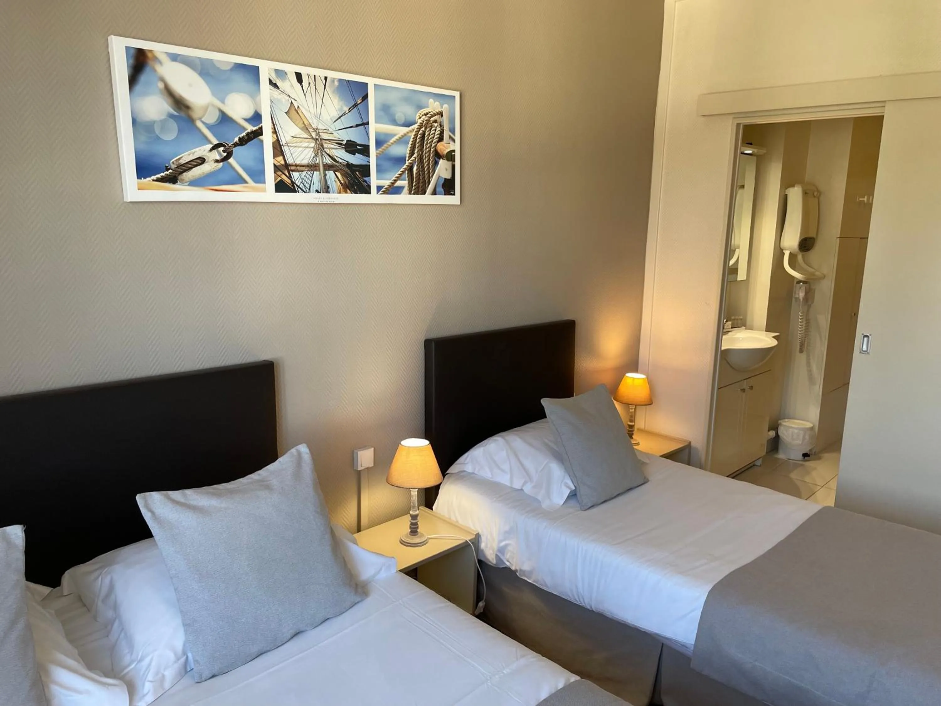 Photo of the whole room, Bed in Hôtel de la Plage