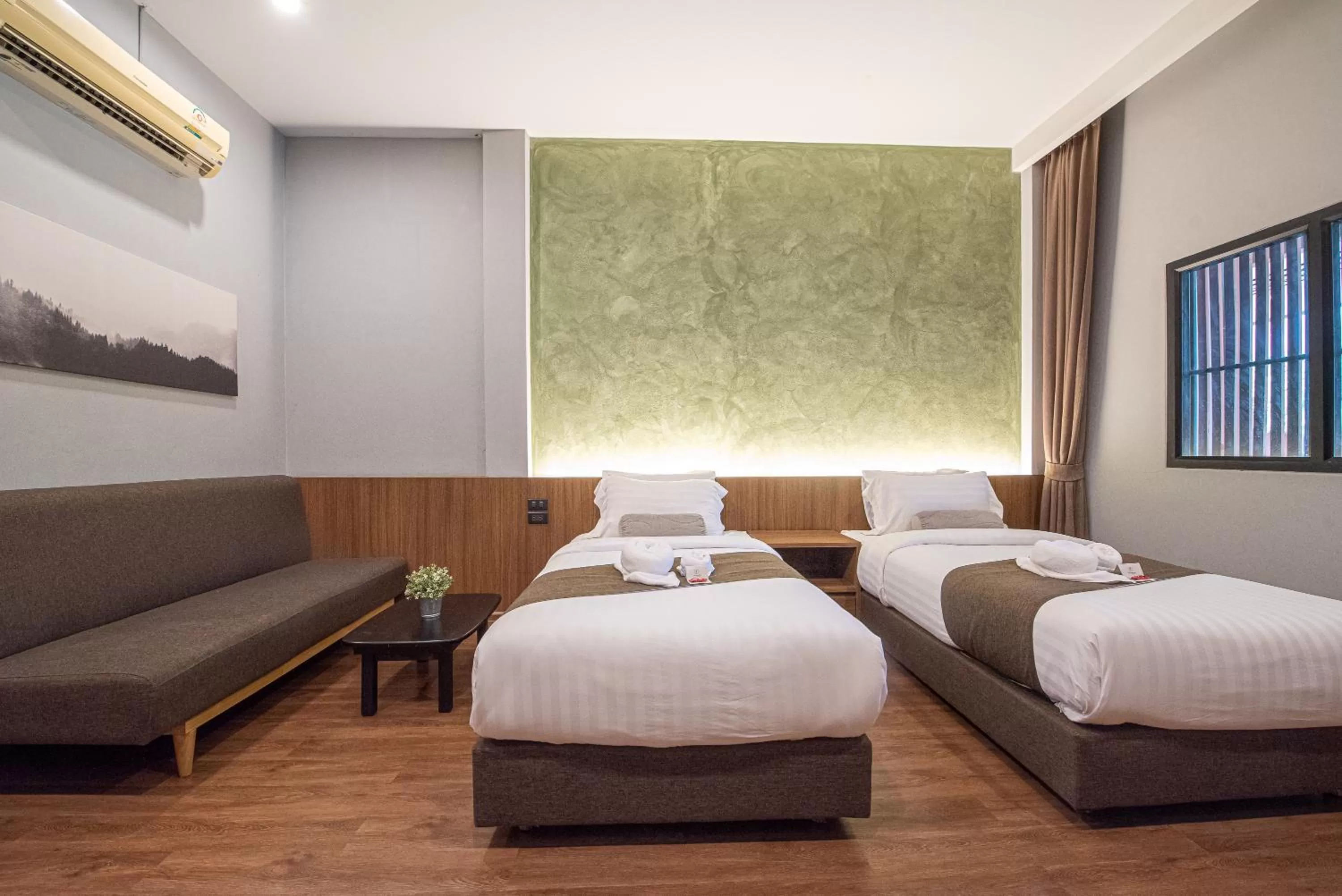 Bed in Tarnsiri Boutique Resort