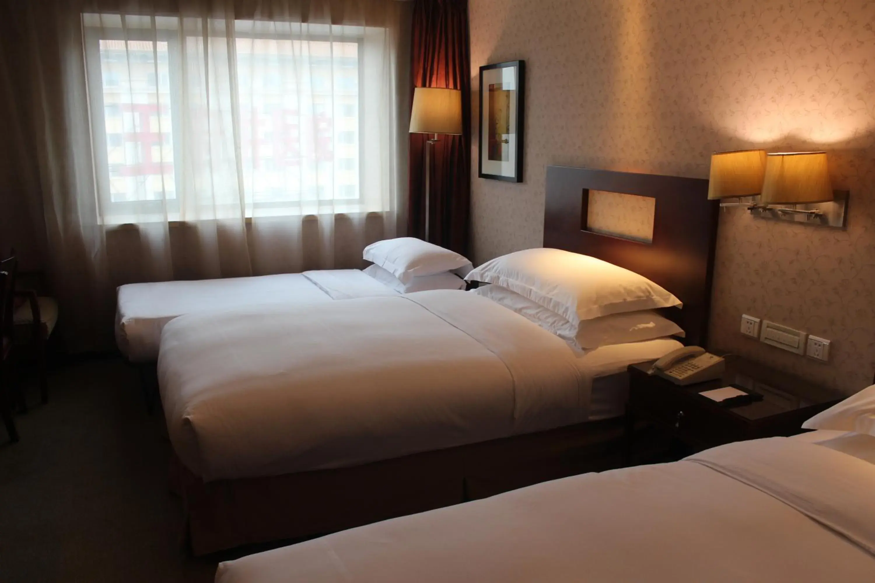 Bed in Sunworld Hotel