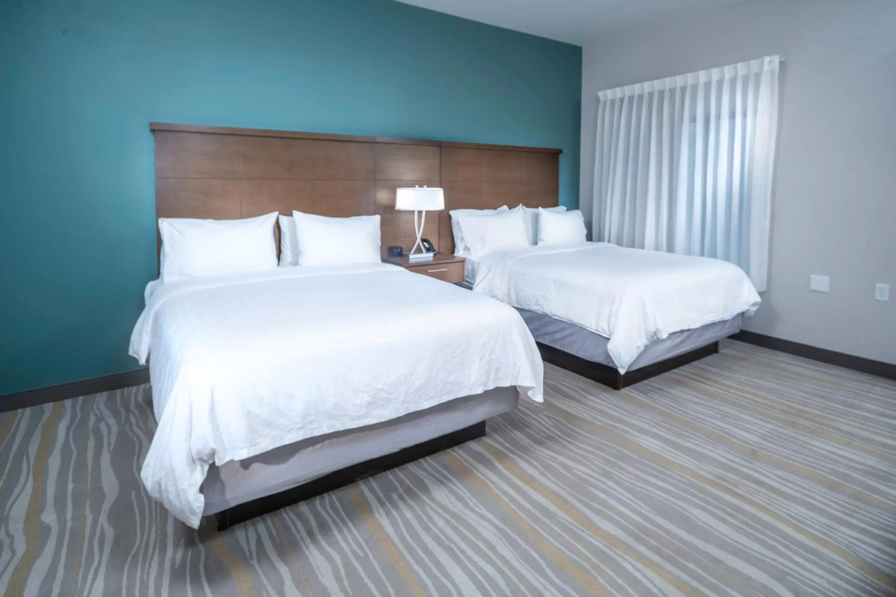 Bed in Staybridge Suites - Summerville by IHG Bed in Staybridge Suites - Summerville by IHG