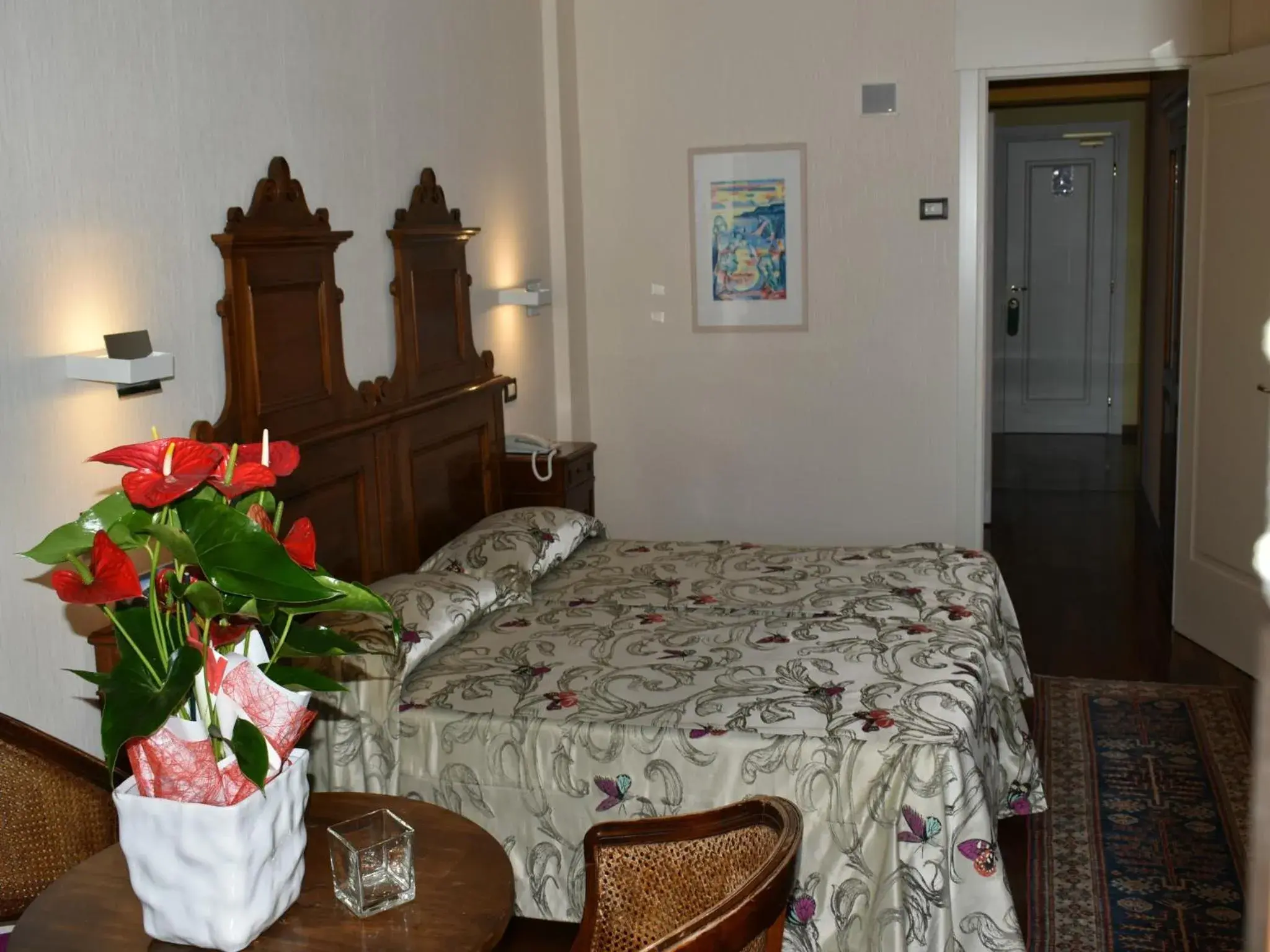 Toilet, Bed in Villa Madrina Wellness Resort Hotel