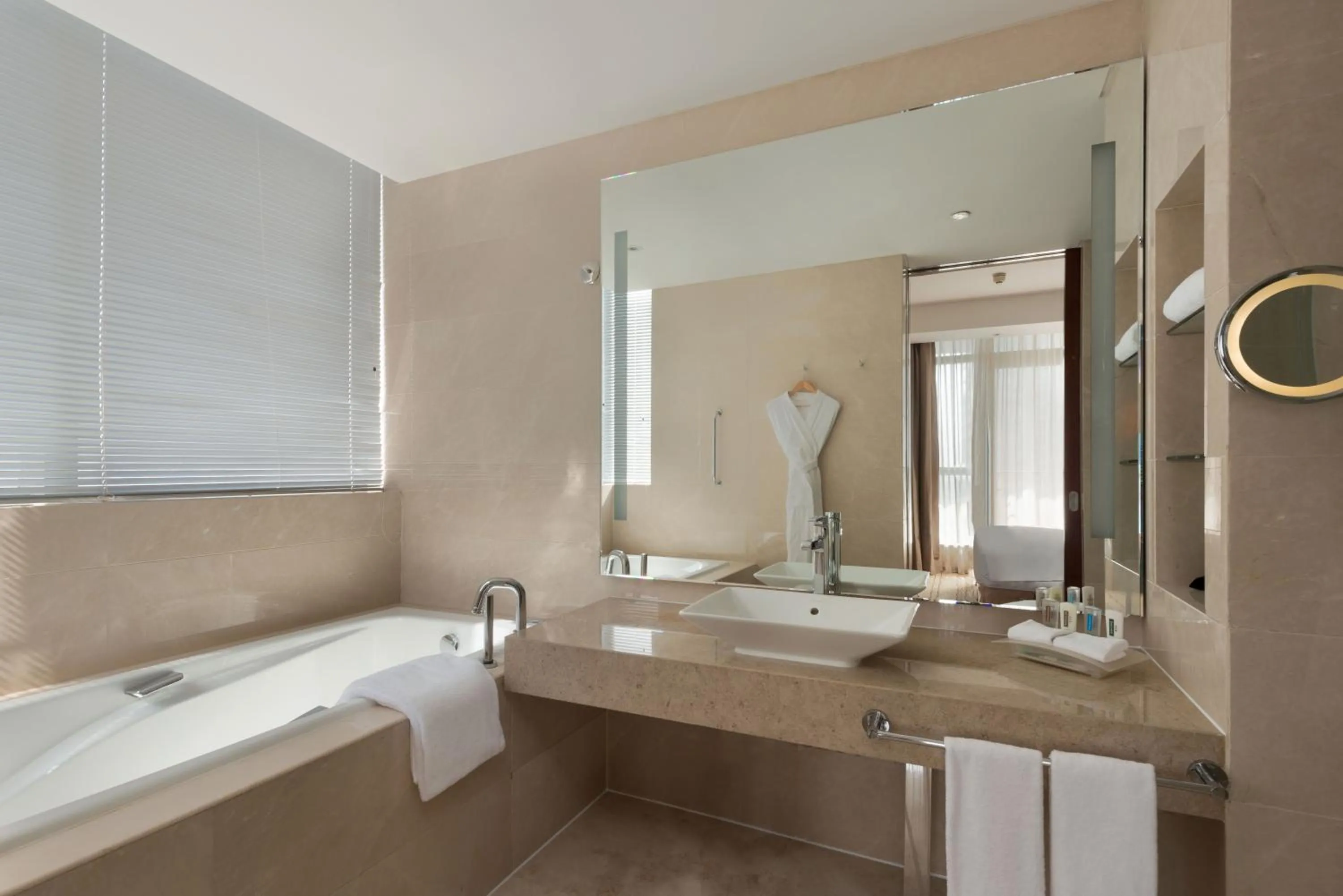 Bathroom in Holiday Inn Taicang City Centre by IHG