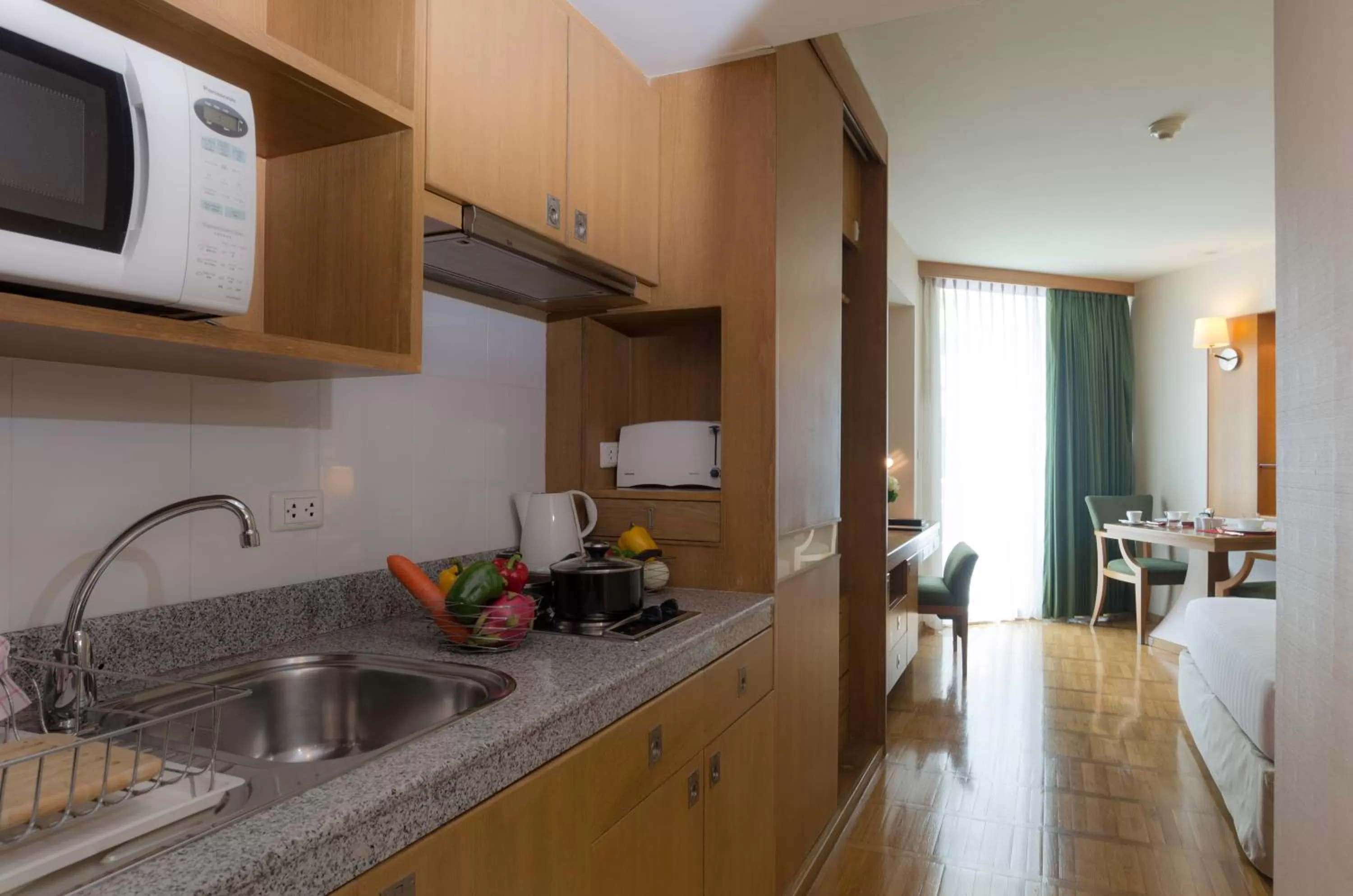 Kitchen or kitchenette in AT EASE saladaeng by AETAS