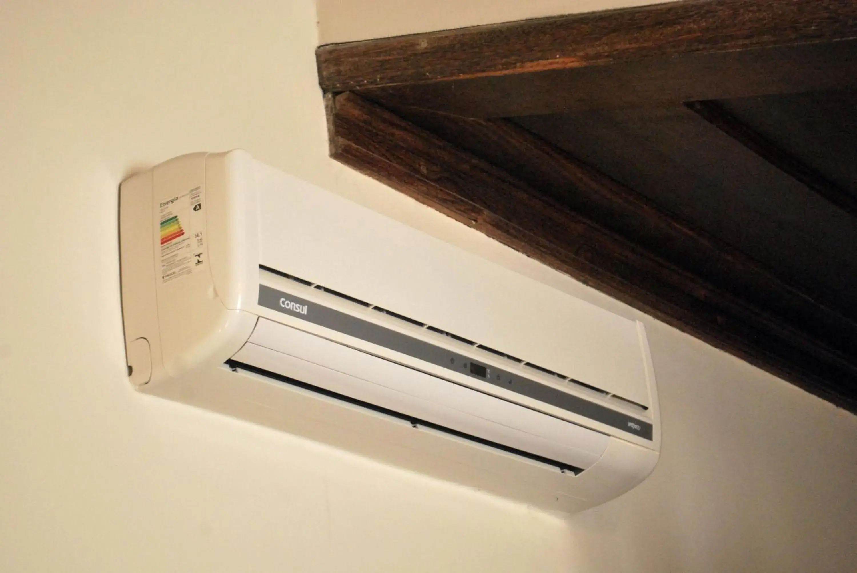 air conditioner, TV/Entertainment Center in Hotel Pousada do Arcanjo