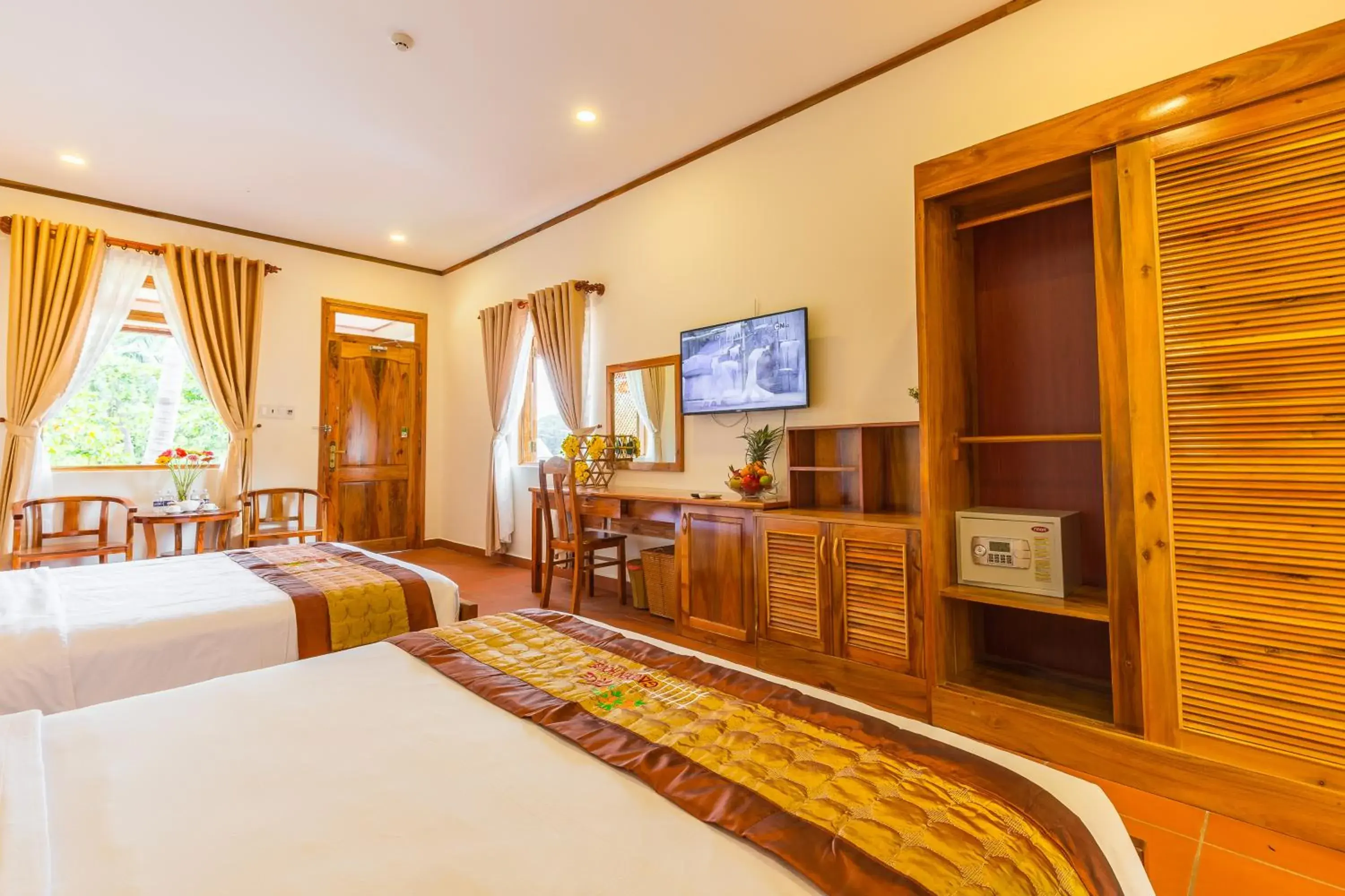 Bedroom, TV/Entertainment Center in The Garden House Phu Quoc Resort