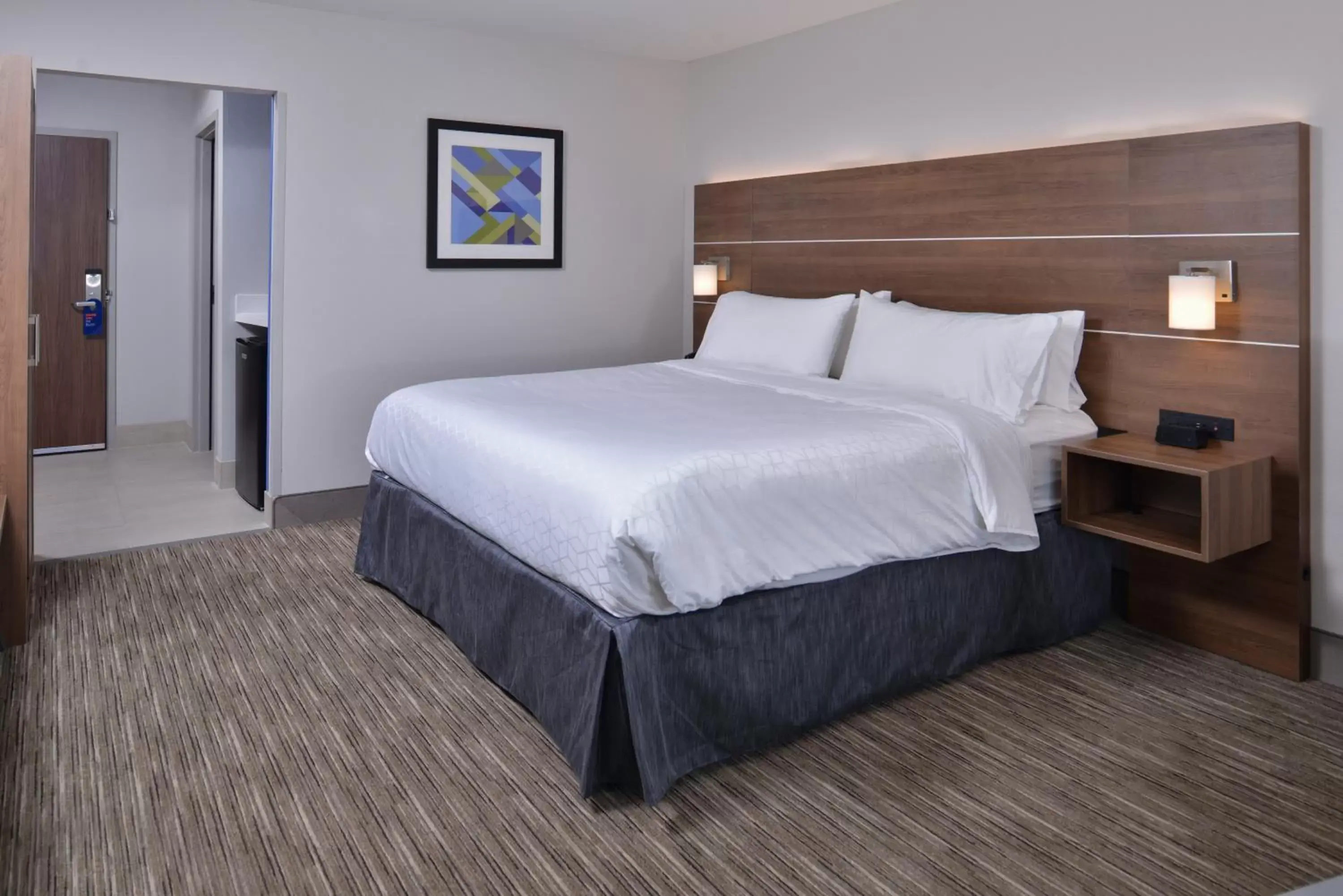 Bedroom, Bed in Holiday Inn Express & Suites - Marshalltown, an IHG Hotel