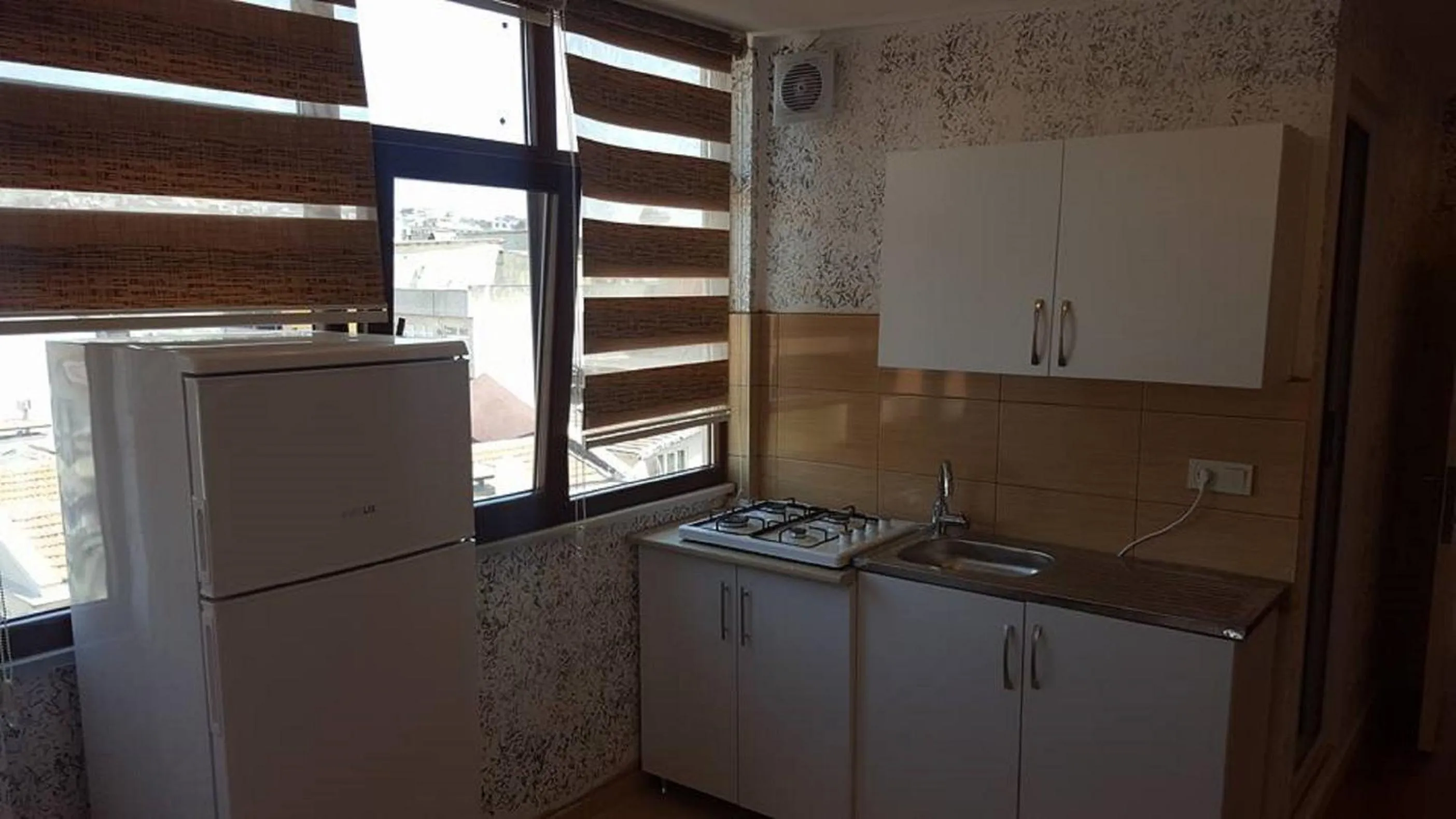 Kitchen or kitchenette in Sun Comfort Hotel