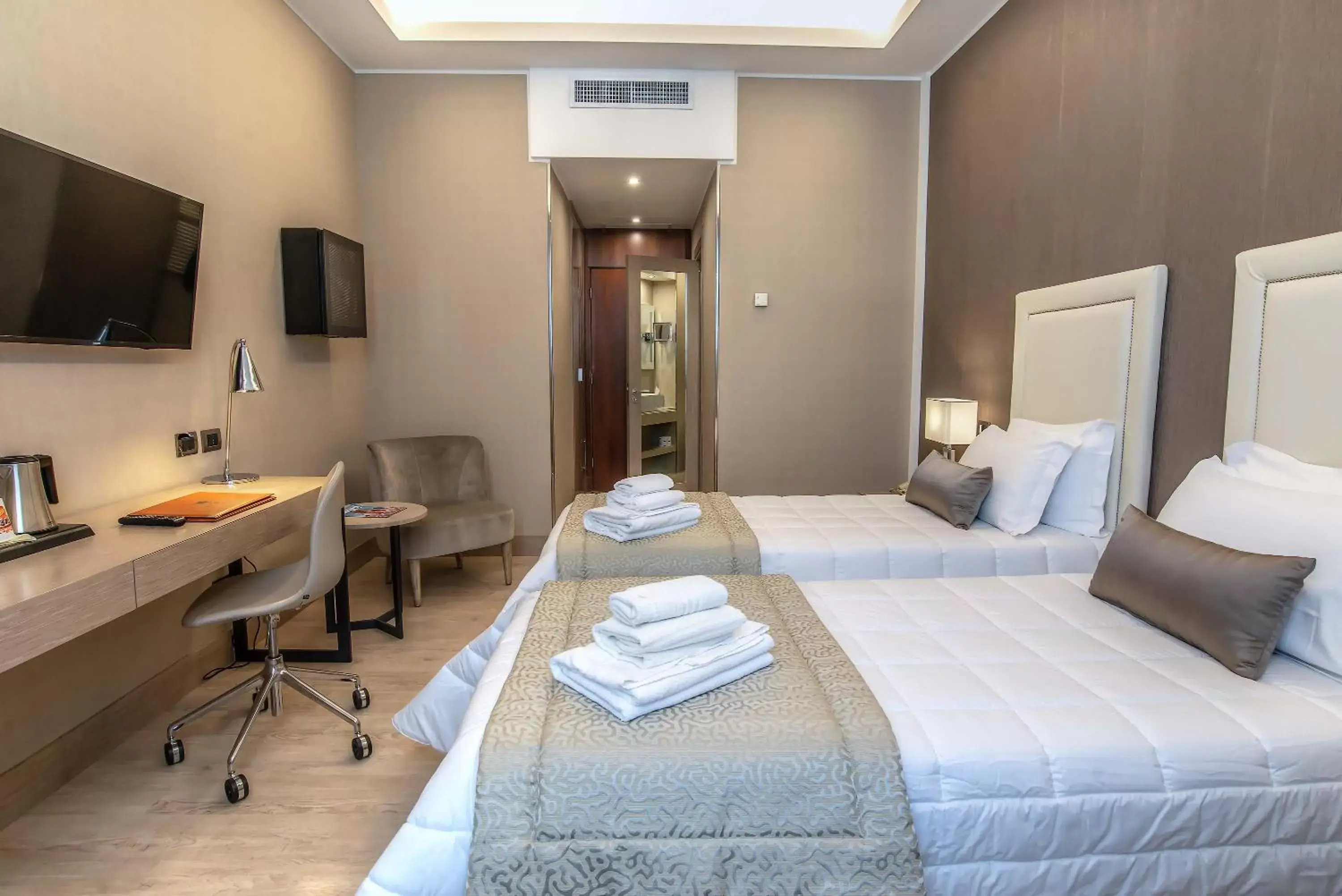 Bed in Hotel Genova