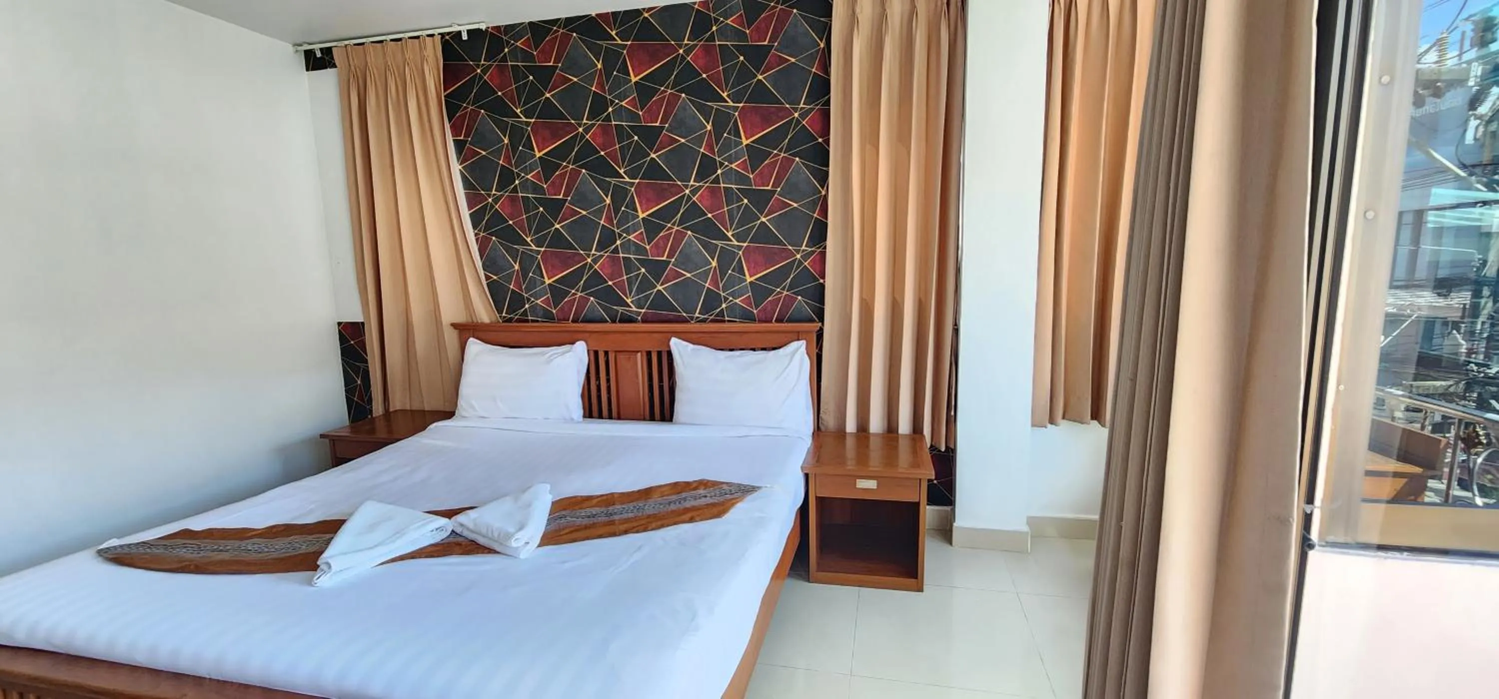 Bed in Royal Sweet Hotel